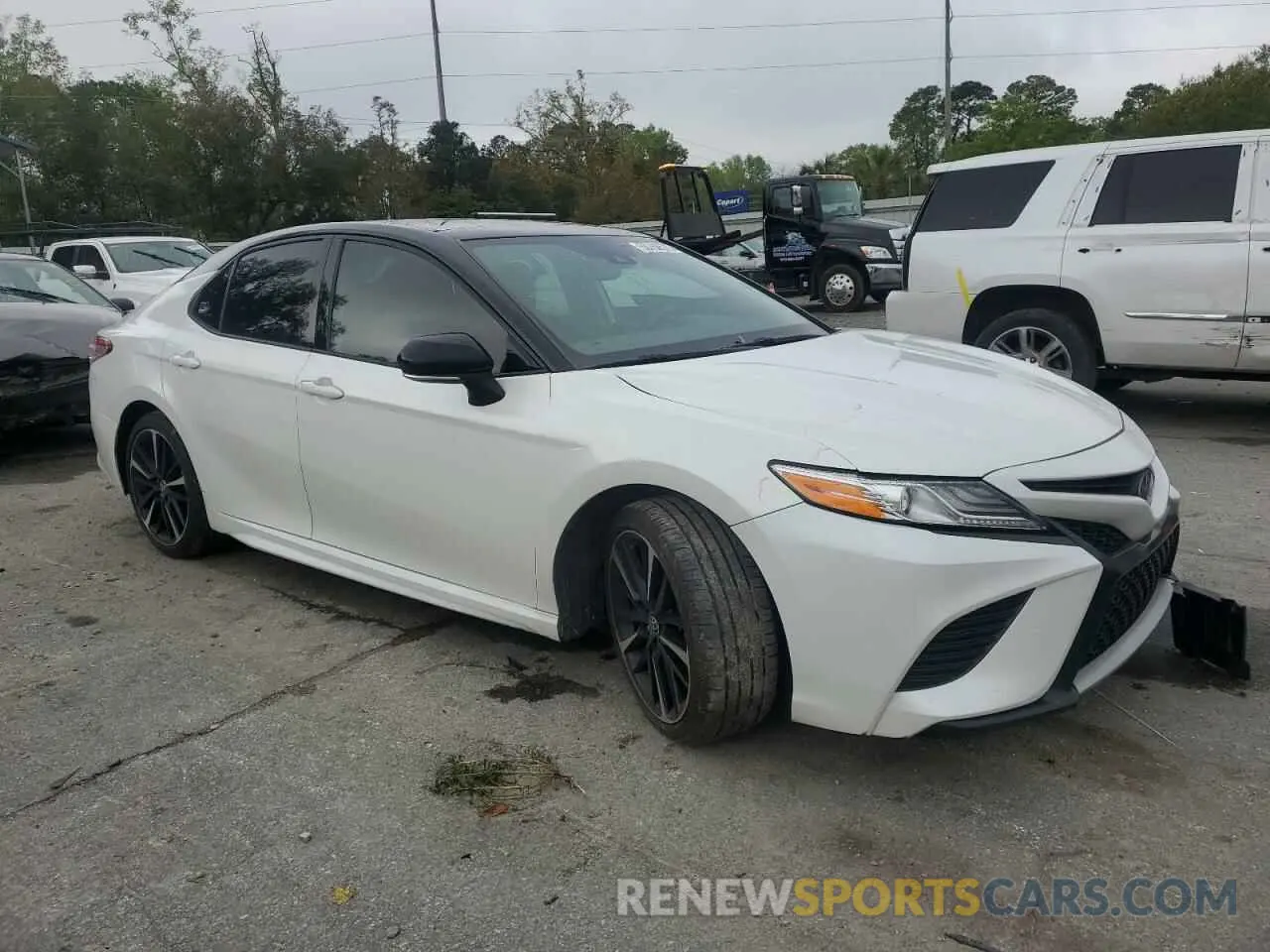 4 Photograph of a damaged car 4T1K61AKXLU374279 TOYOTA CAMRY 2020