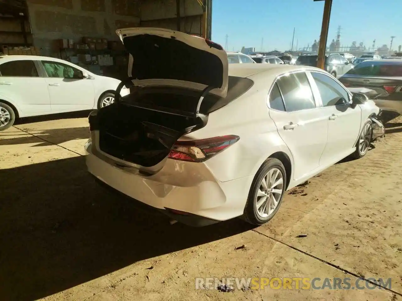 4 Photograph of a damaged car 4T1C11AK1MU594981 TOYOTA CAMRY 2021