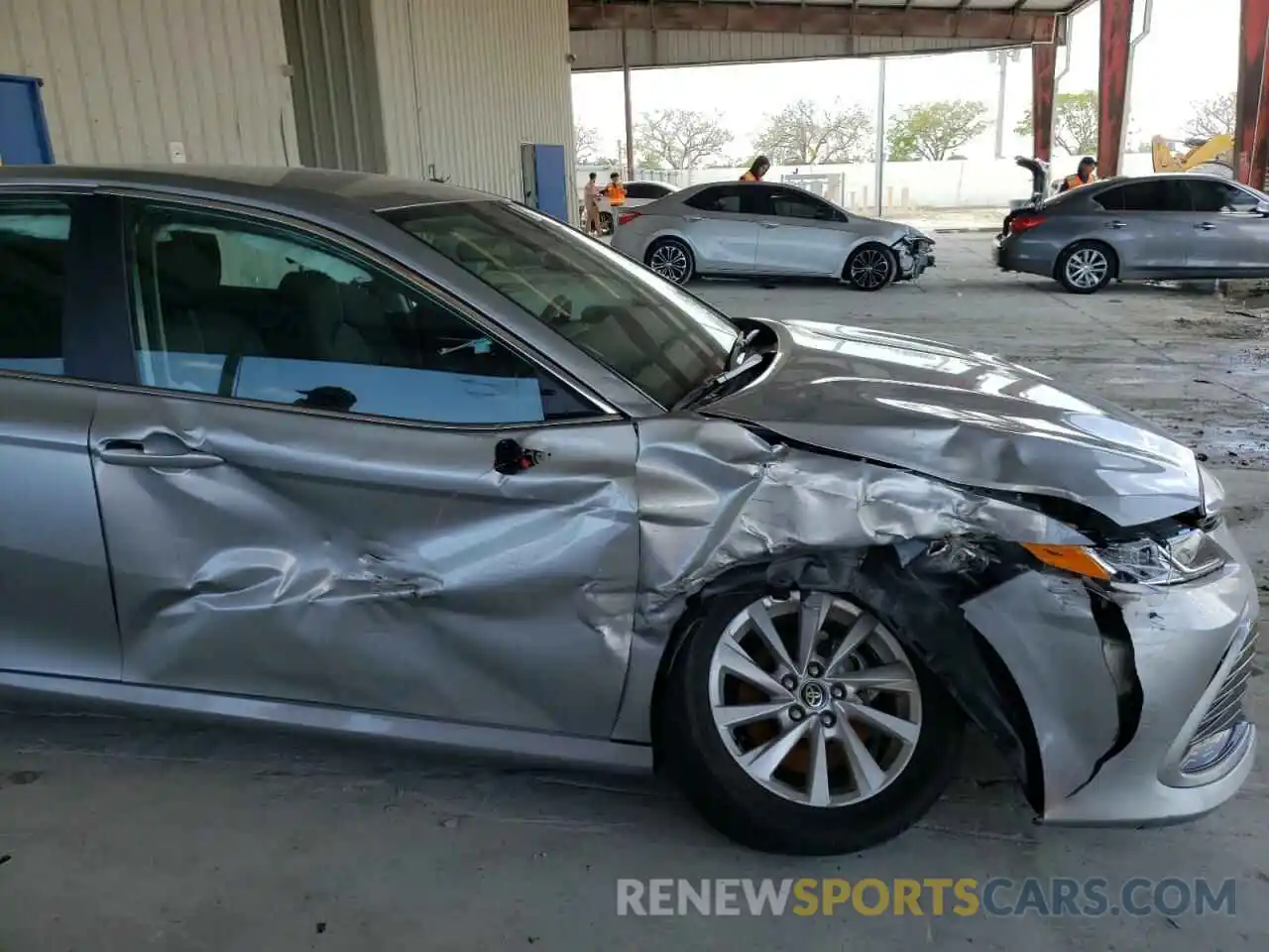 9 Photograph of a damaged car 4T1C11AK4MU569962 TOYOTA CAMRY 2021