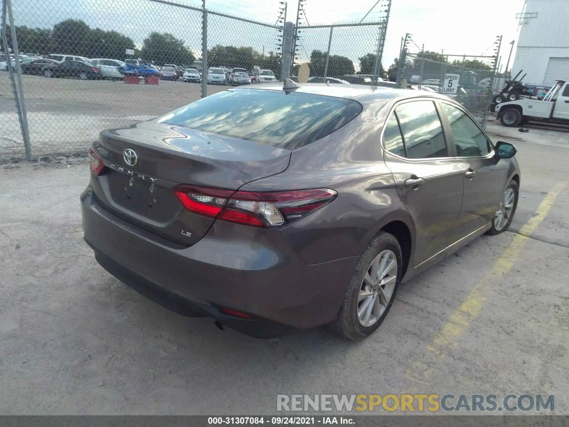 4 Photograph of a damaged car 4T1C11AK5MU557125 TOYOTA CAMRY 2021