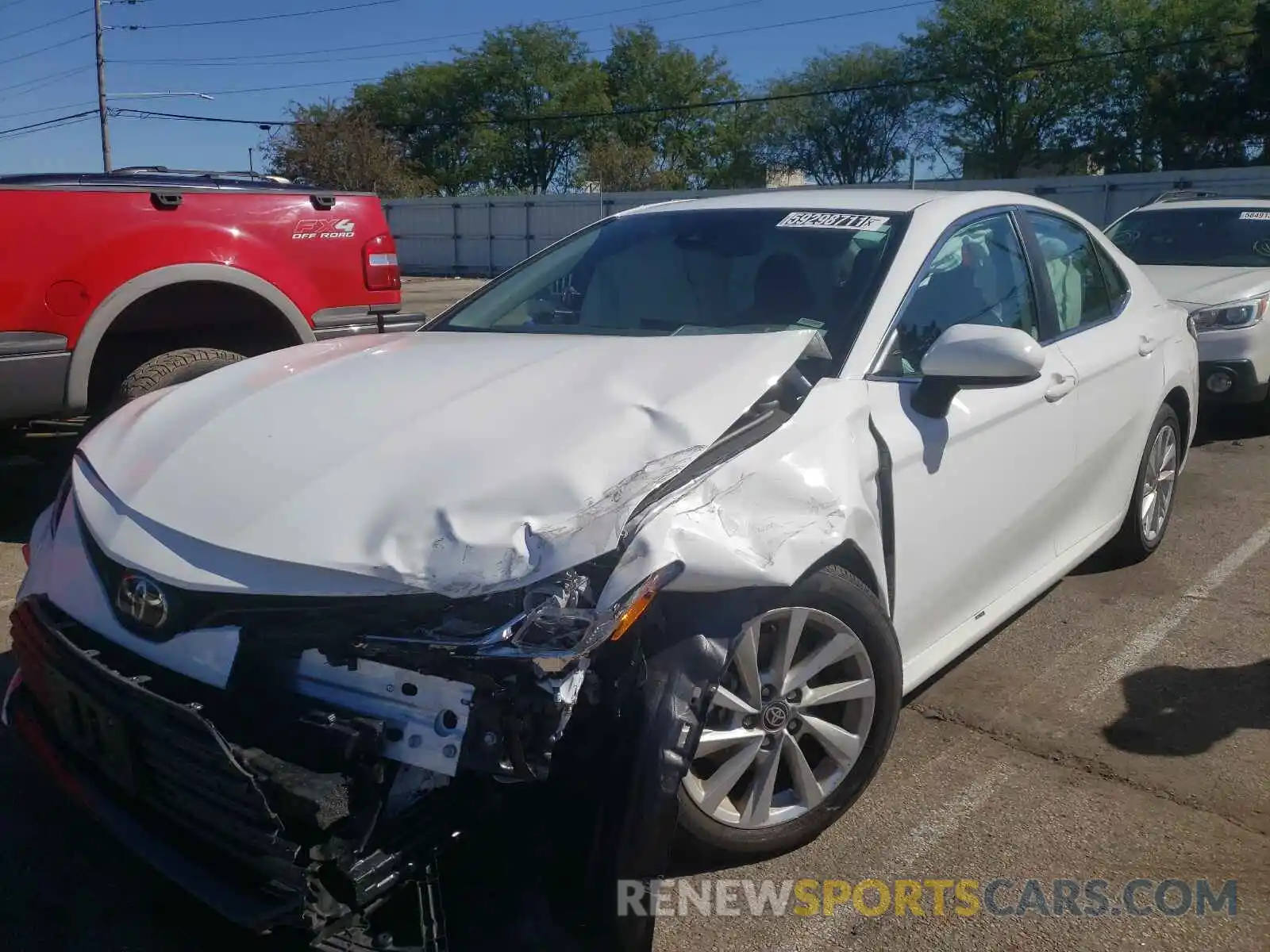 2 Photograph of a damaged car 4T1C11AK8MU463482 TOYOTA CAMRY 2021