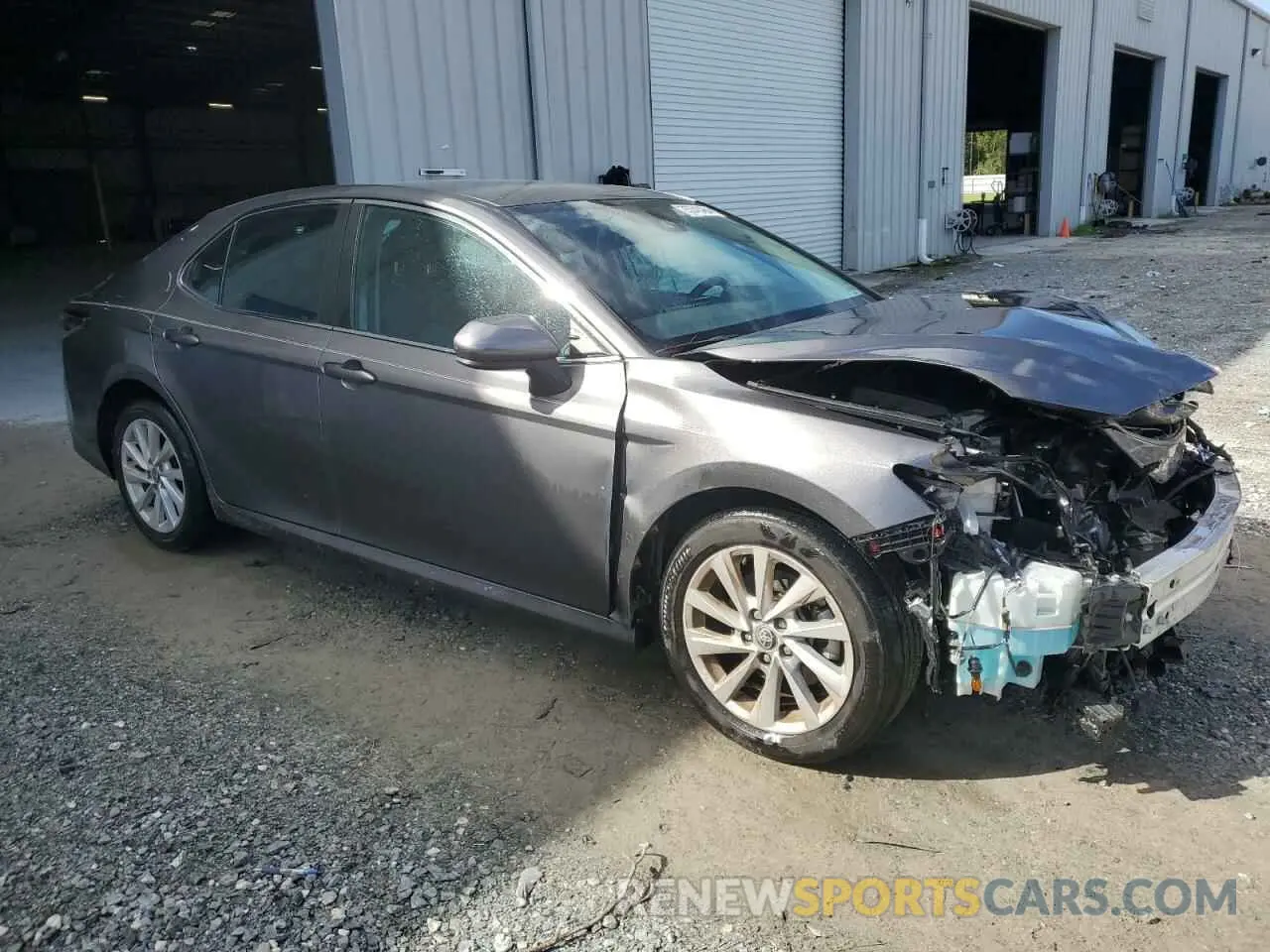 4 Photograph of a damaged car 4T1C11AK8MU569897 TOYOTA CAMRY 2021