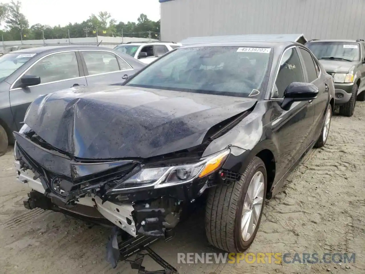 2 Photograph of a damaged car 4T1C11AK9MU477004 TOYOTA CAMRY 2021