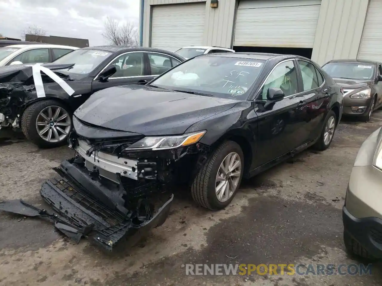 2 Photograph of a damaged car 4T1C11AK9MU613339 TOYOTA CAMRY 2021