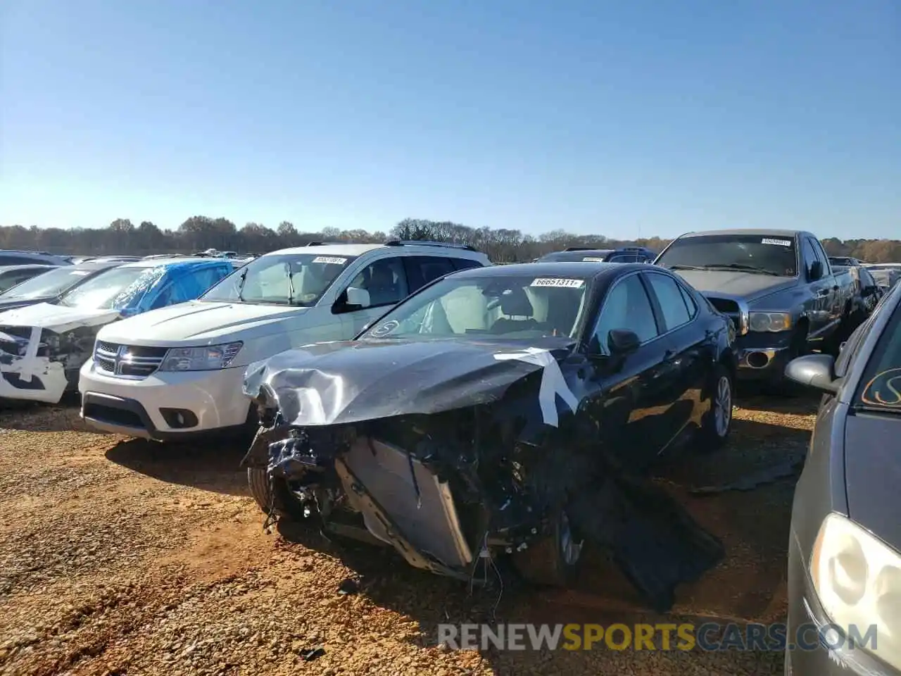 2 Photograph of a damaged car 4T1C11AKXMU453519 TOYOTA CAMRY 2021