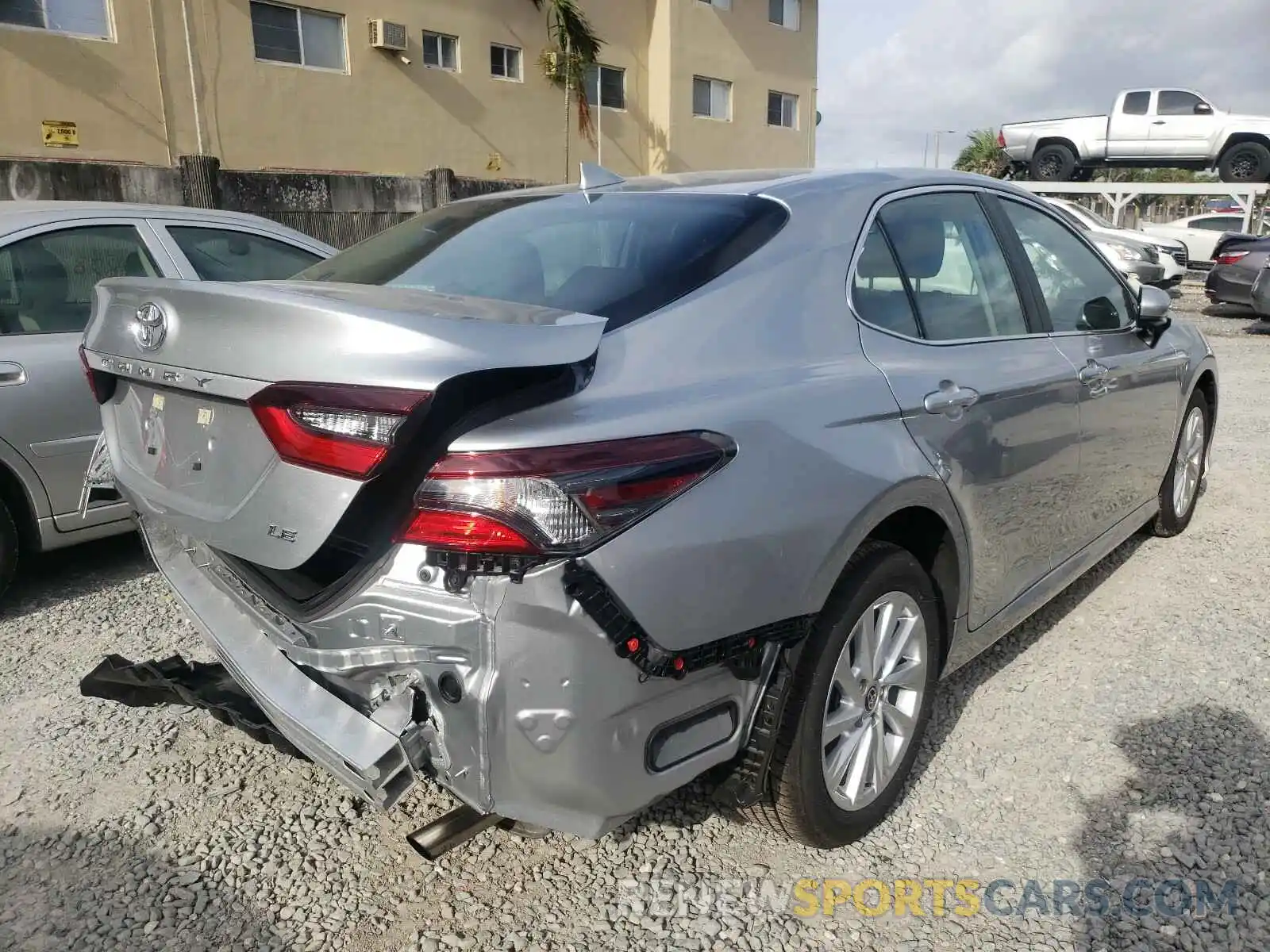 4 Photograph of a damaged car 4T1C11AKXMU559811 TOYOTA CAMRY 2021