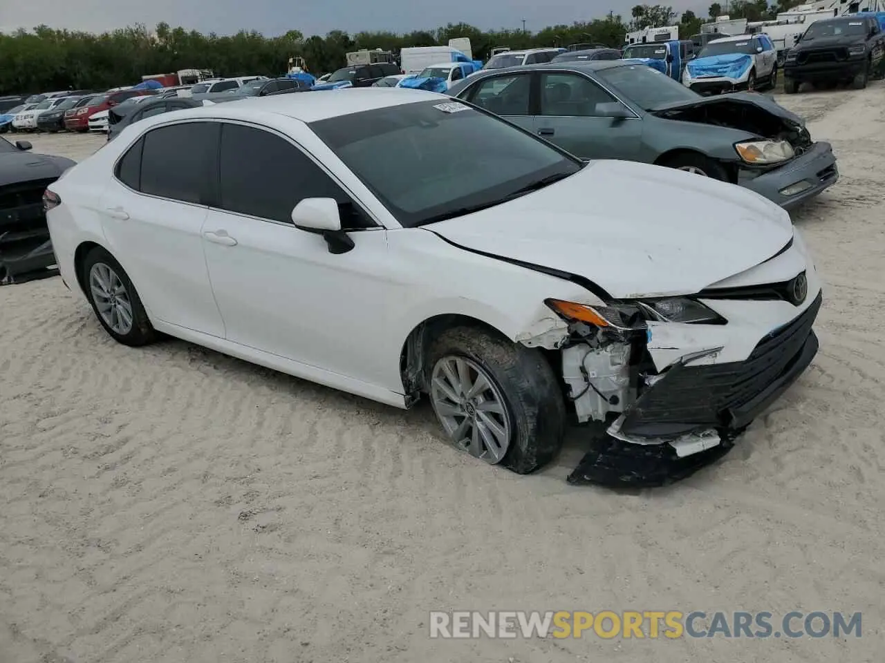 4 Photograph of a damaged car 4T1C11AKXMU584451 TOYOTA CAMRY 2021