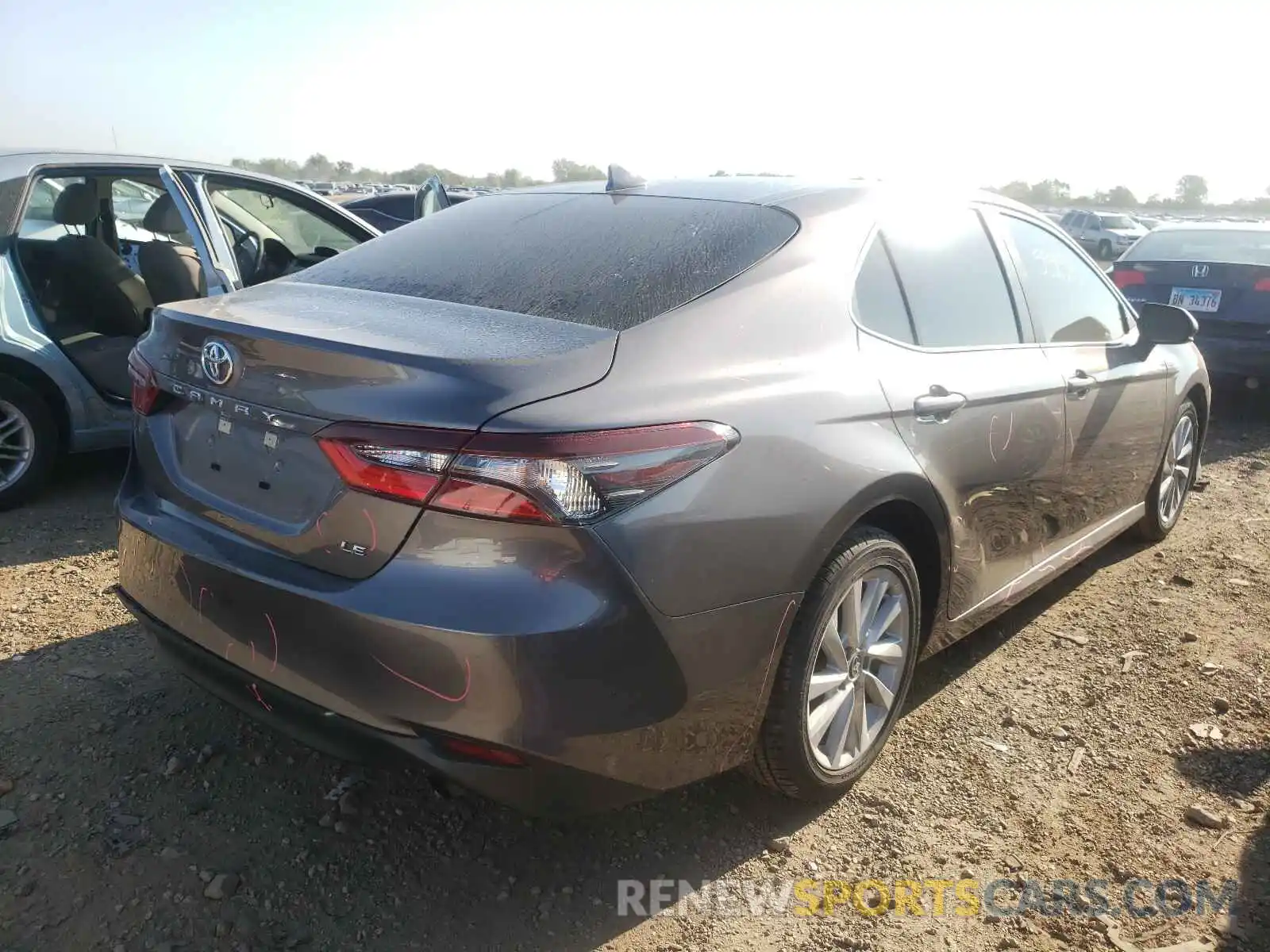 4 Photograph of a damaged car 4T1C11AKXMU597555 TOYOTA CAMRY 2021