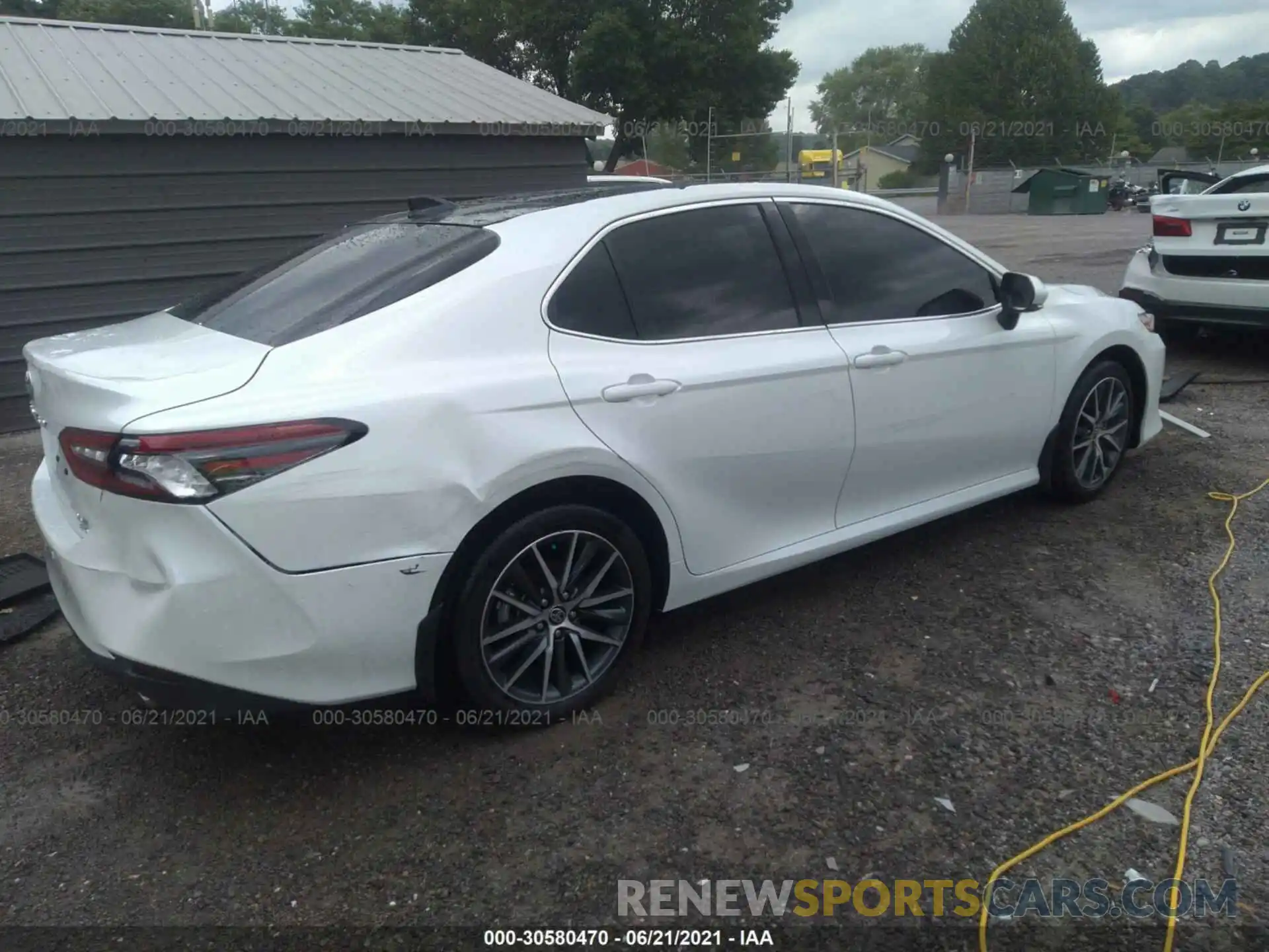 4 Photograph of a damaged car 4T1F11BKXMU033089 TOYOTA CAMRY 2021