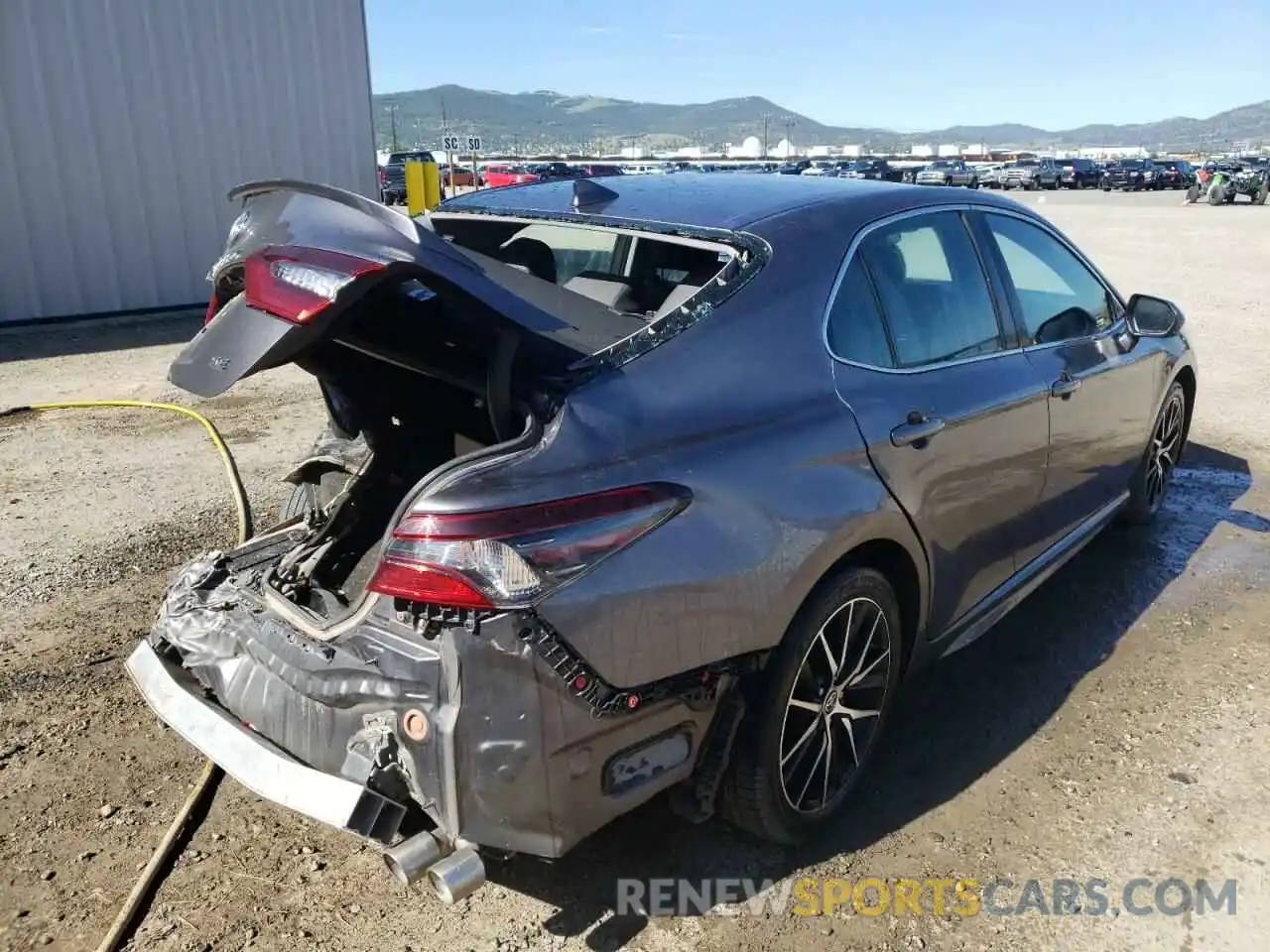 4 Photograph of a damaged car 4T1G11AK0MU413970 TOYOTA CAMRY 2021