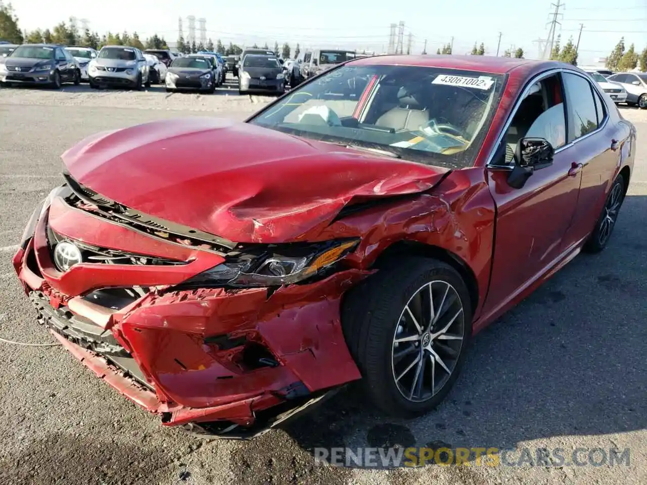 2 Photograph of a damaged car 4T1G11AK0MU434608 TOYOTA CAMRY 2021