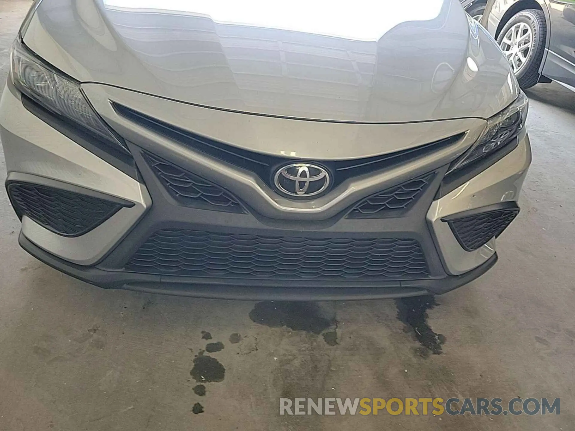 12 Photograph of a damaged car 4T1G11AK0MU446497 TOYOTA CAMRY 2021