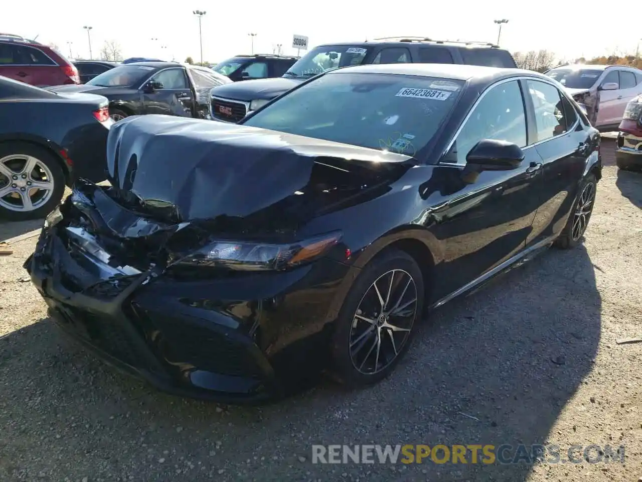 2 Photograph of a damaged car 4T1G11AK0MU465616 TOYOTA CAMRY 2021