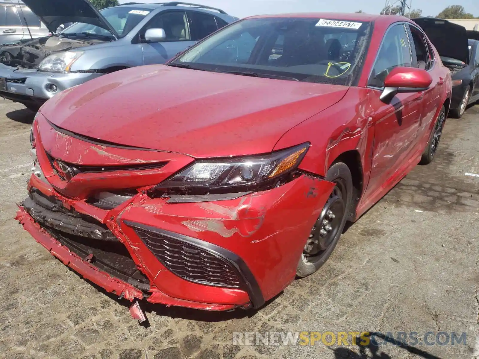 2 Photograph of a damaged car 4T1G11AK0MU472677 TOYOTA CAMRY 2021