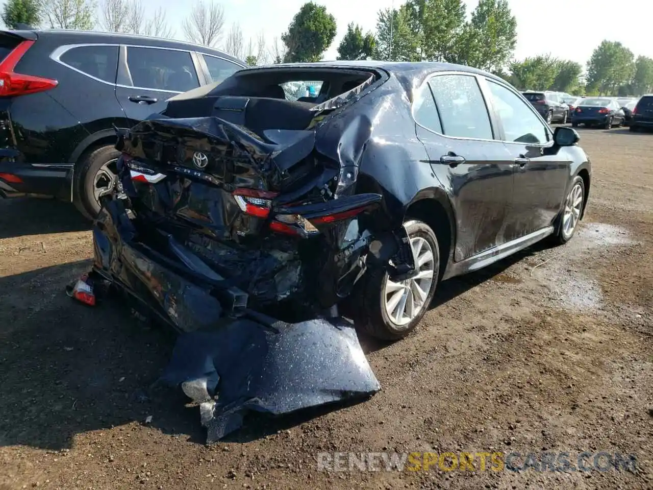 4 Photograph of a damaged car 4T1G11AK0MU558863 TOYOTA CAMRY 2021