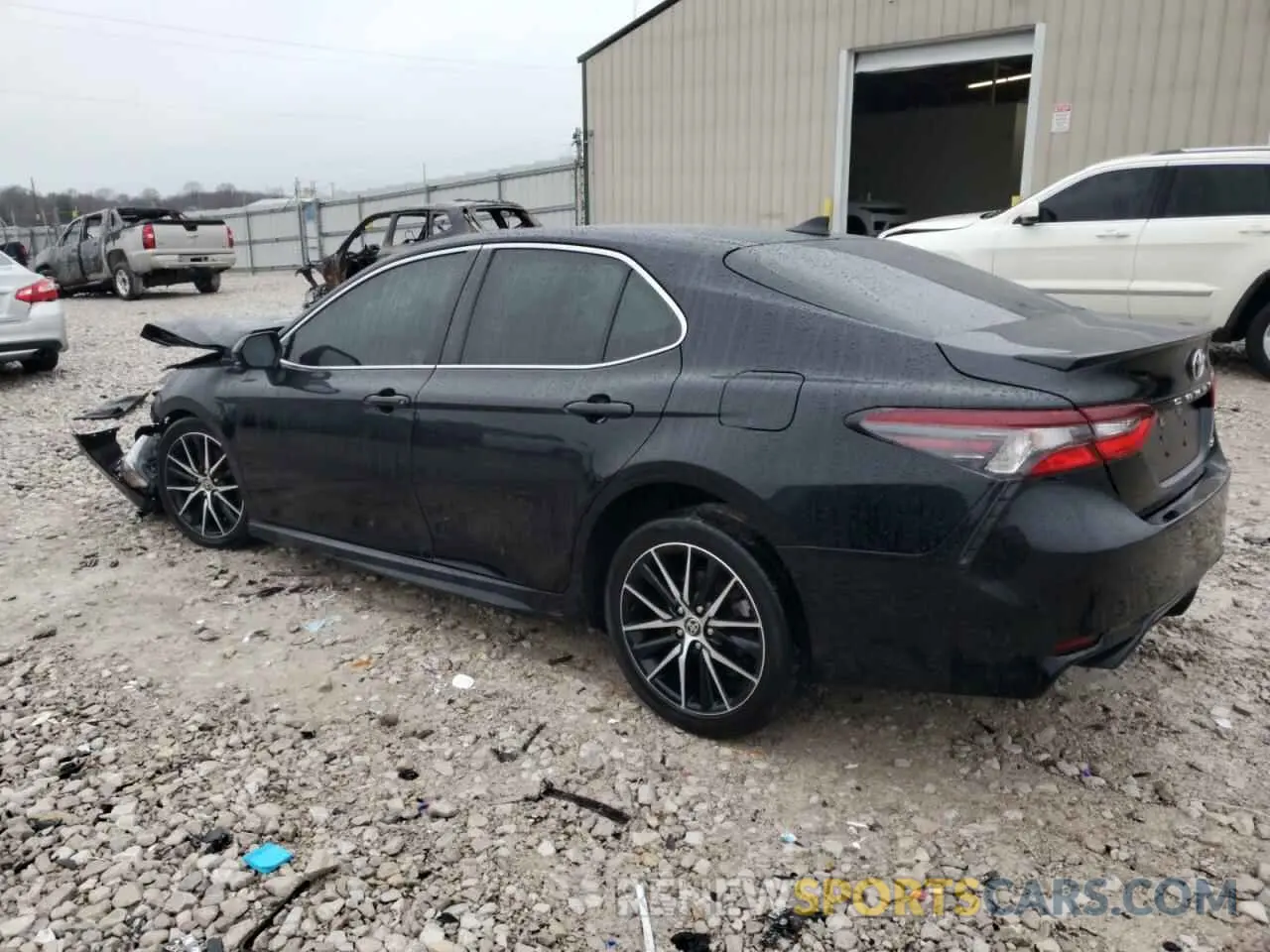 2 Photograph of a damaged car 4T1G11AK0MU561049 TOYOTA CAMRY 2021