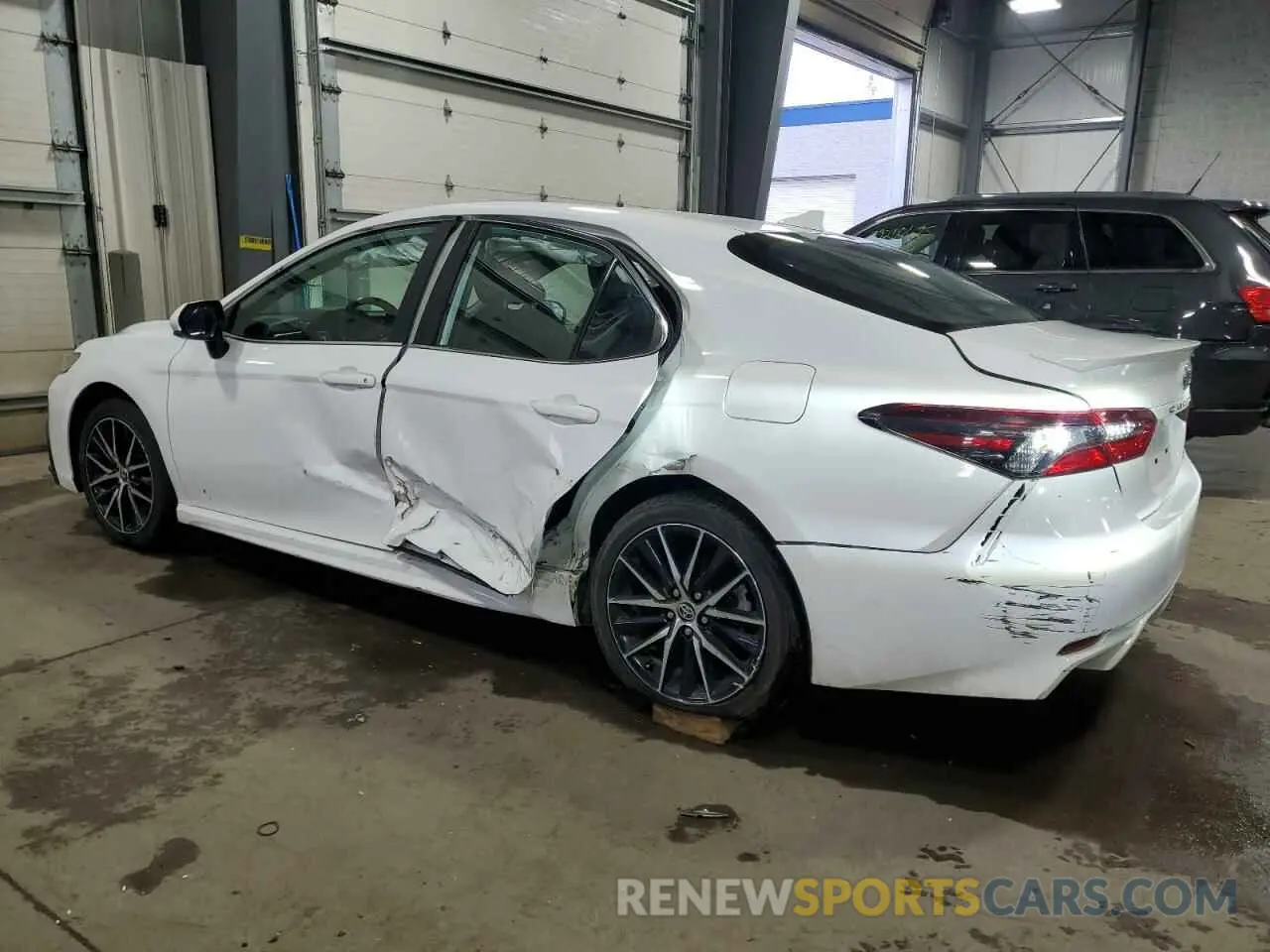 2 Photograph of a damaged car 4T1G11AK0MU561603 TOYOTA CAMRY 2021