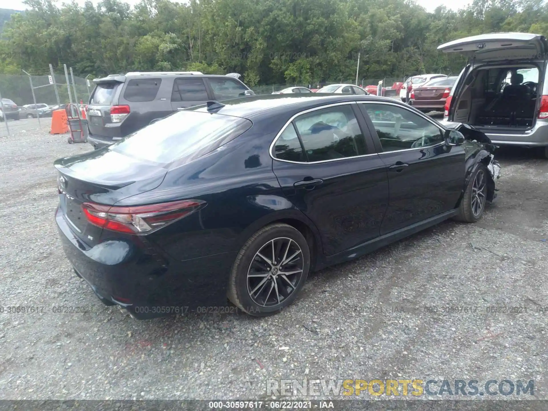 4 Photograph of a damaged car 4T1G11AK0MU590180 TOYOTA CAMRY 2021