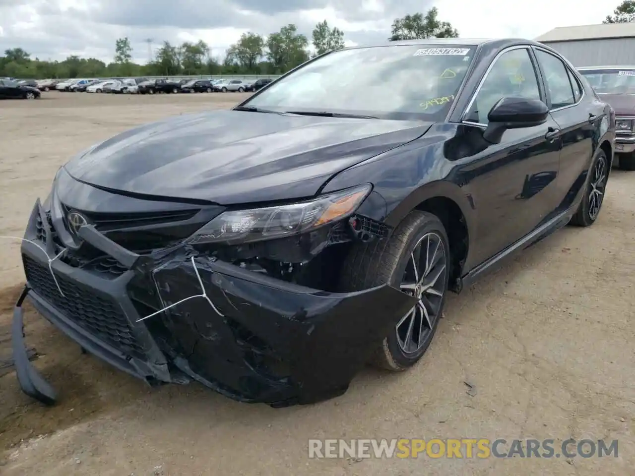 2 Photograph of a damaged car 4T1G11AK0MU599297 TOYOTA CAMRY 2021