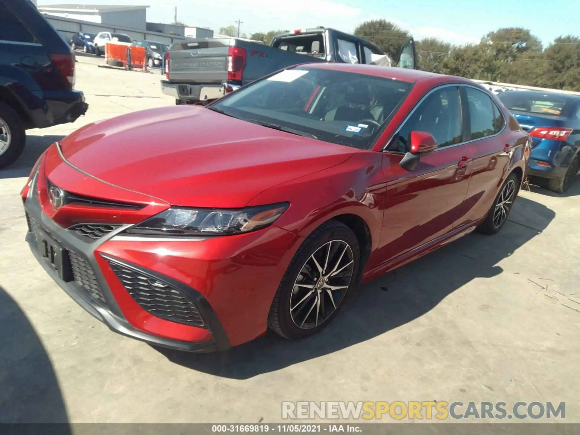 2 Photograph of a damaged car 4T1G11AK1MU411211 TOYOTA CAMRY 2021