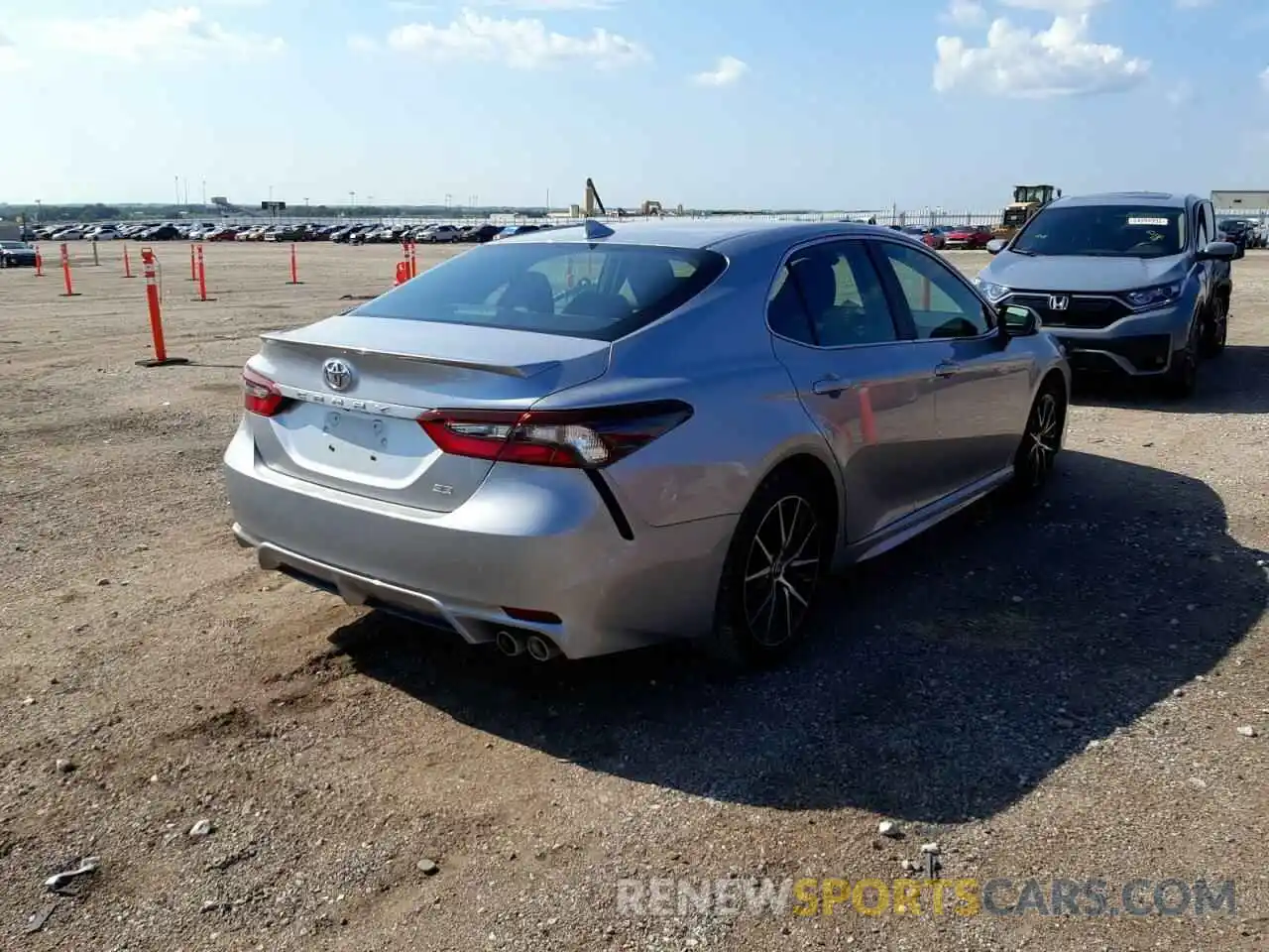 4 Photograph of a damaged car 4T1G11AK1MU522180 TOYOTA CAMRY 2021