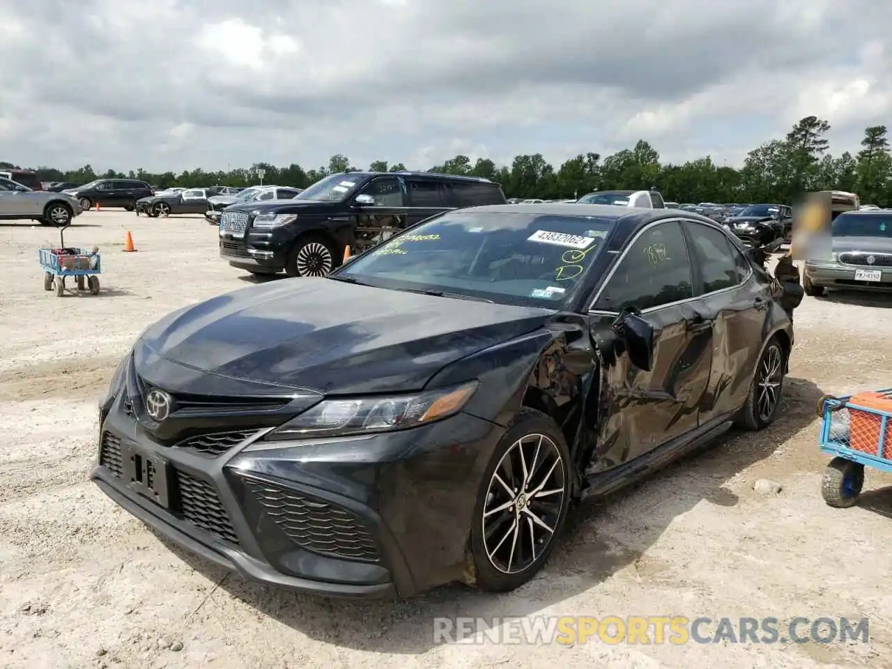 2 Photograph of a damaged car 4T1G11AK1MU543630 TOYOTA CAMRY 2021