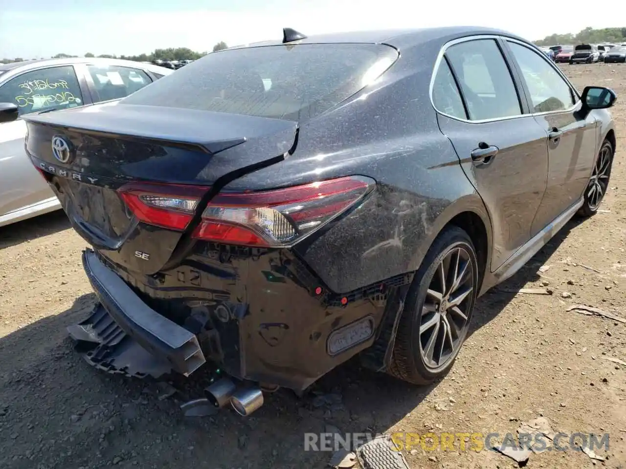 4 Photograph of a damaged car 4T1G11AK1MU584193 TOYOTA CAMRY 2021