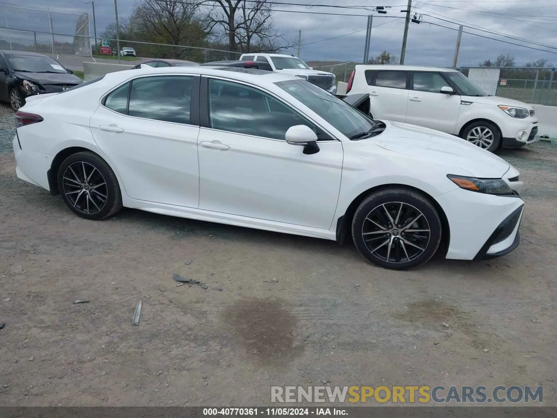13 Photograph of a damaged car 4T1G11AK2MU561313 TOYOTA CAMRY 2021