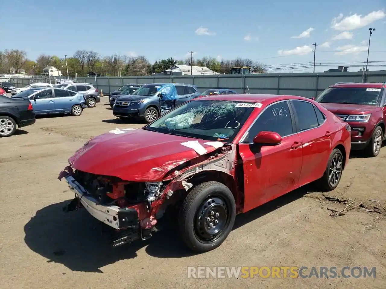 2 Photograph of a damaged car 4T1G11AK3MU438961 TOYOTA CAMRY 2021