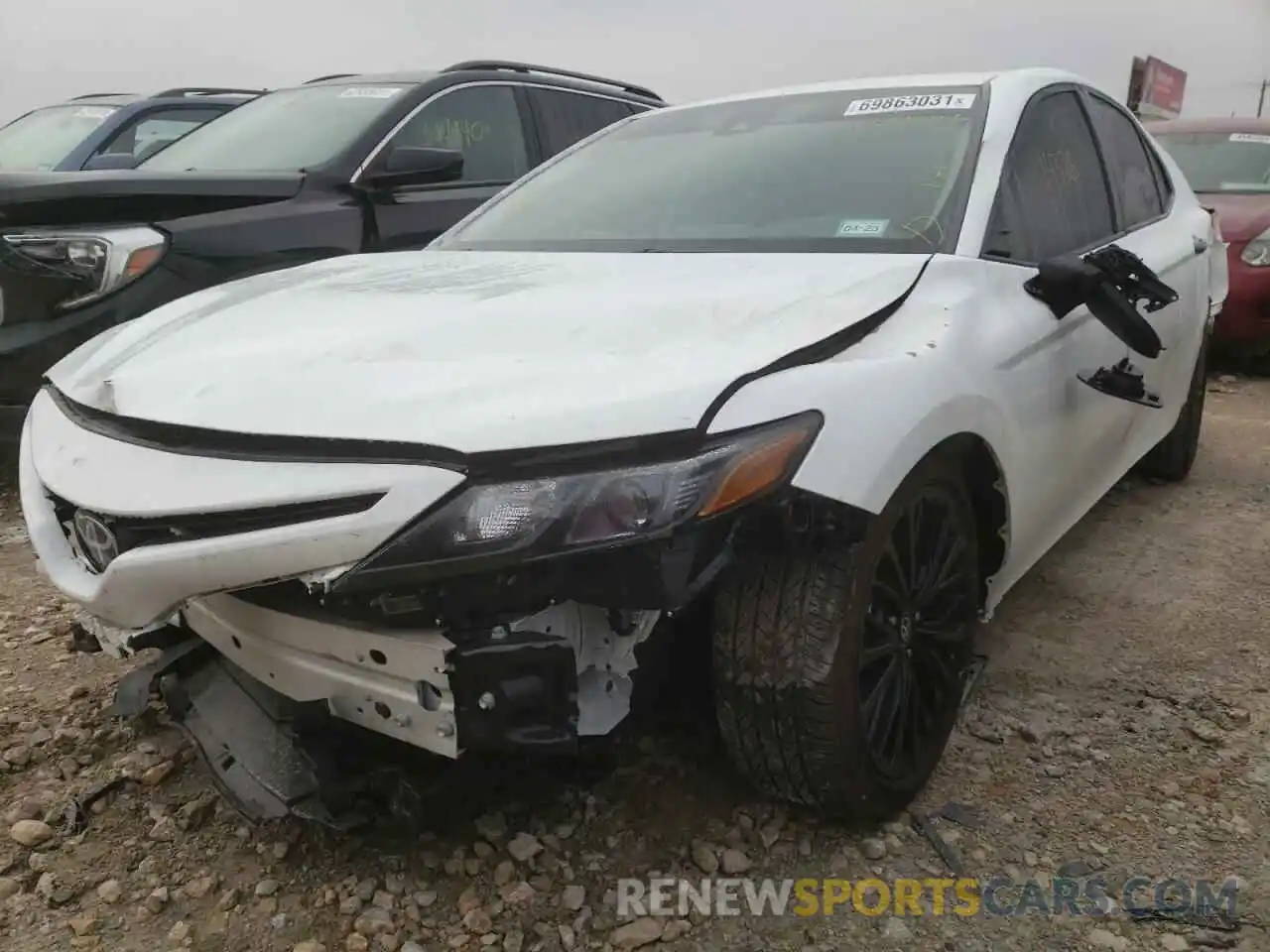 2 Photograph of a damaged car 4T1G11AK3MU451144 TOYOTA CAMRY 2021