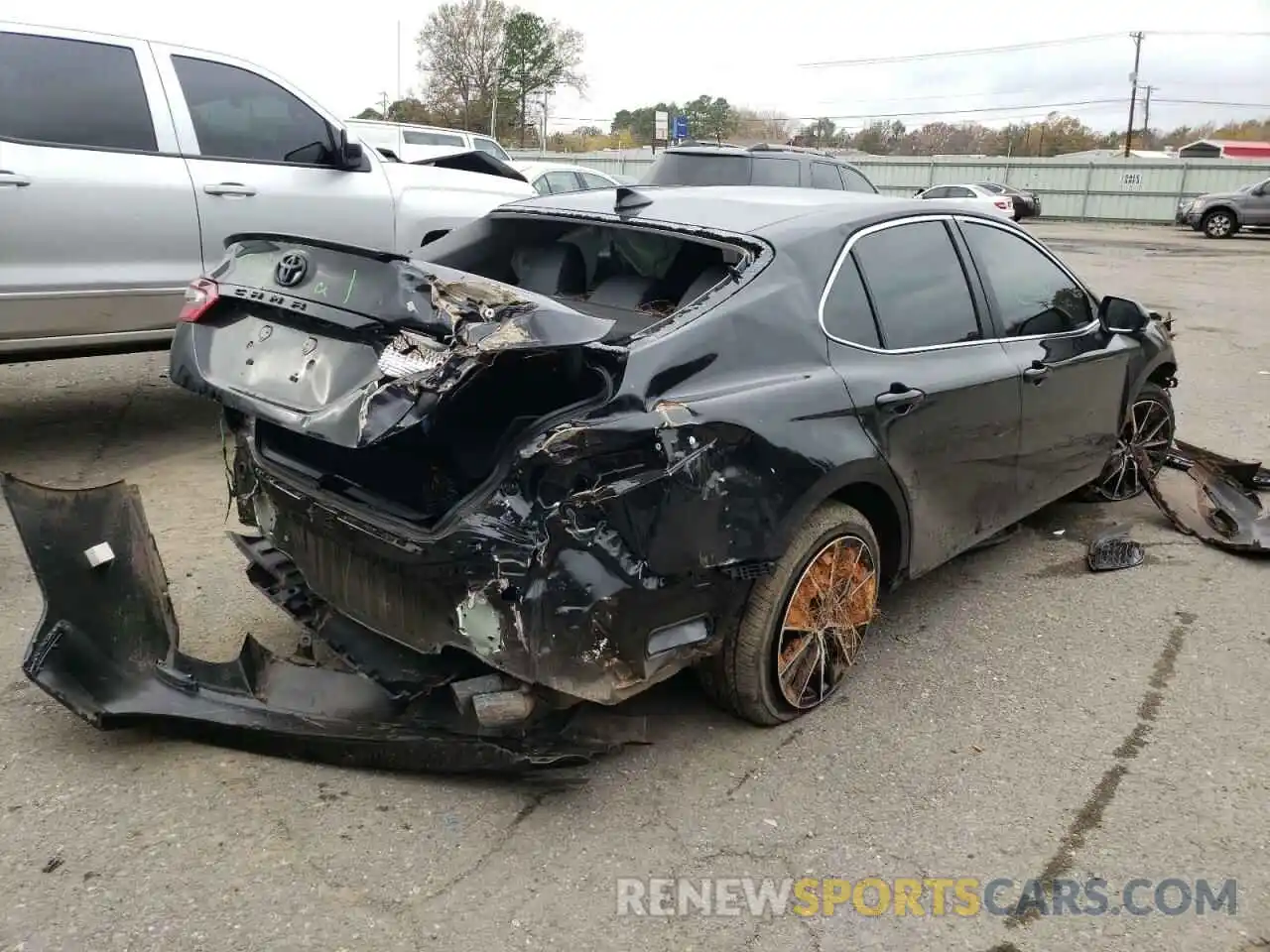 4 Photograph of a damaged car 4T1G11AK3MU482913 TOYOTA CAMRY 2021