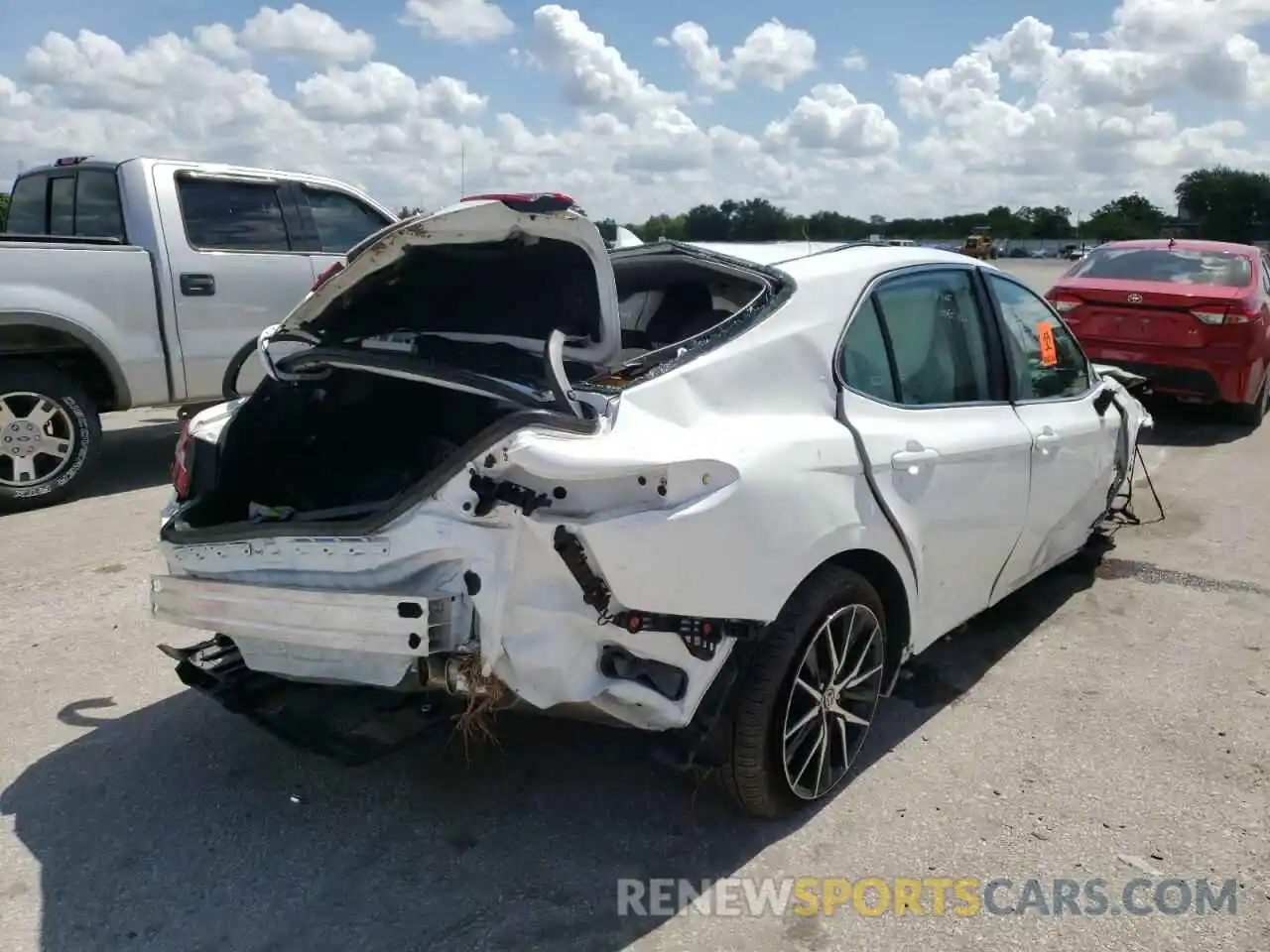 4 Photograph of a damaged car 4T1G11AK3MU557030 TOYOTA CAMRY 2021