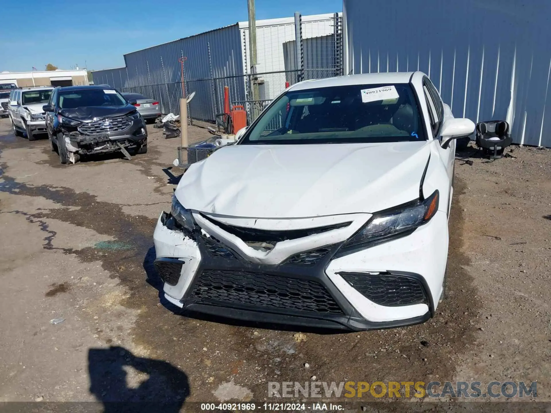 12 Photograph of a damaged car 4T1G11AK3MU560462 TOYOTA CAMRY 2021