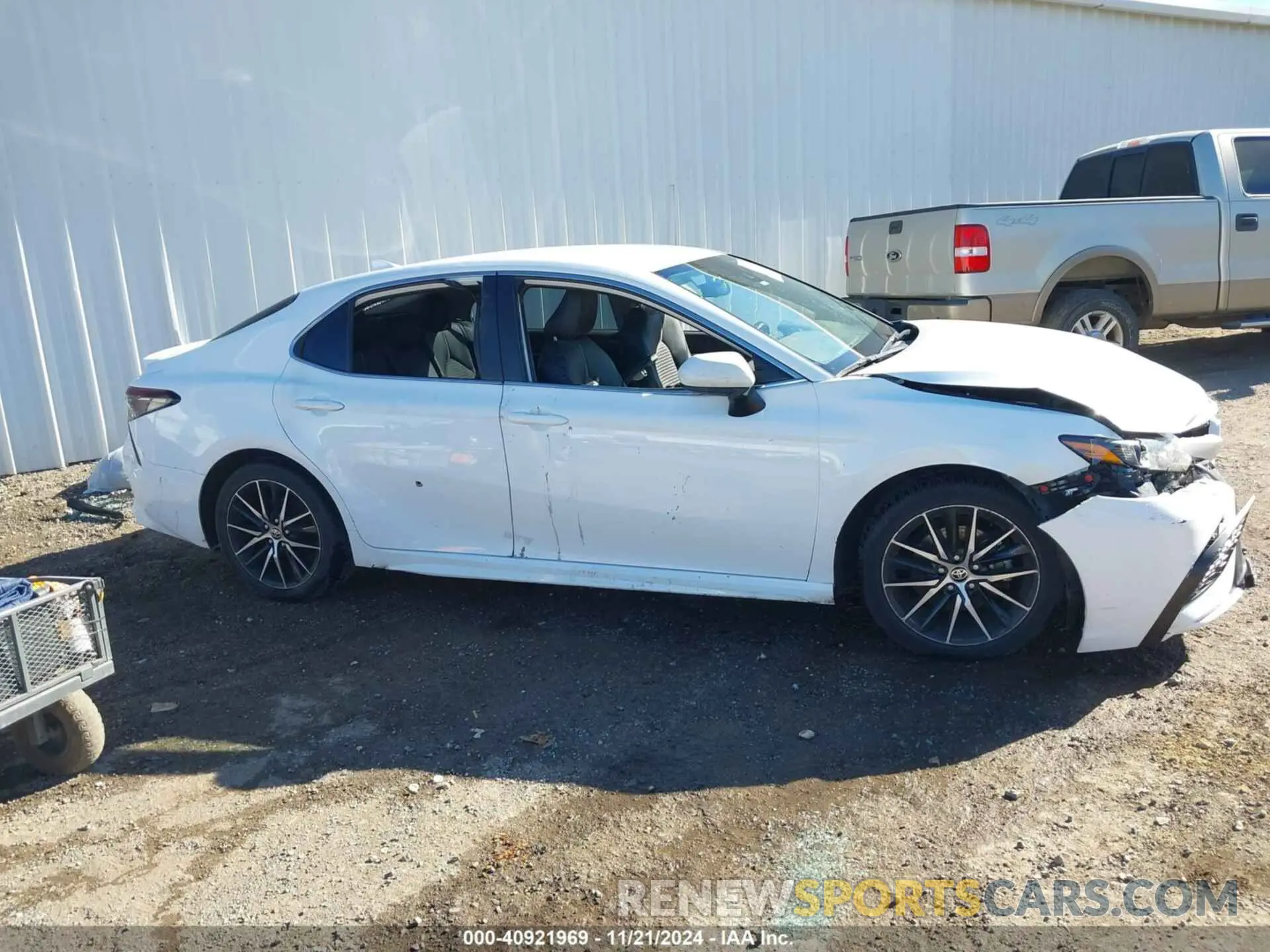 13 Photograph of a damaged car 4T1G11AK3MU560462 TOYOTA CAMRY 2021