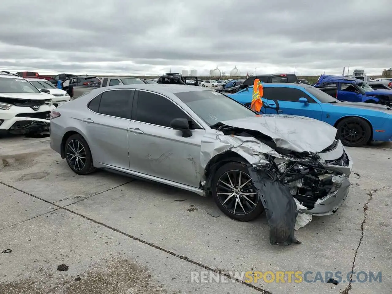 4 Photograph of a damaged car 4T1G11AK3MU591940 TOYOTA CAMRY 2021