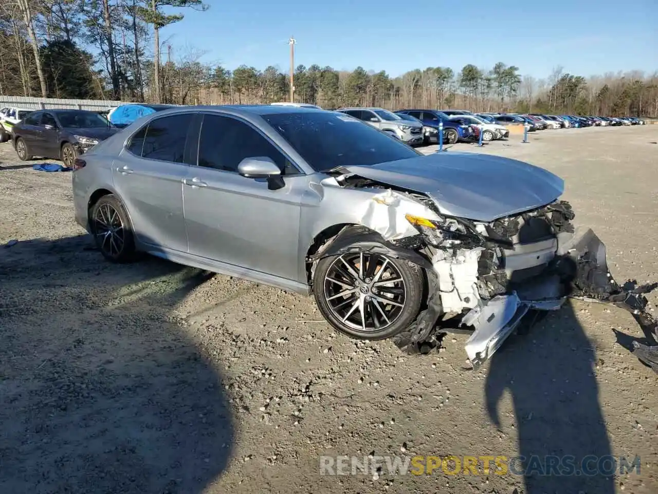 4 Photograph of a damaged car 4T1G11AK3MU607649 TOYOTA CAMRY 2021