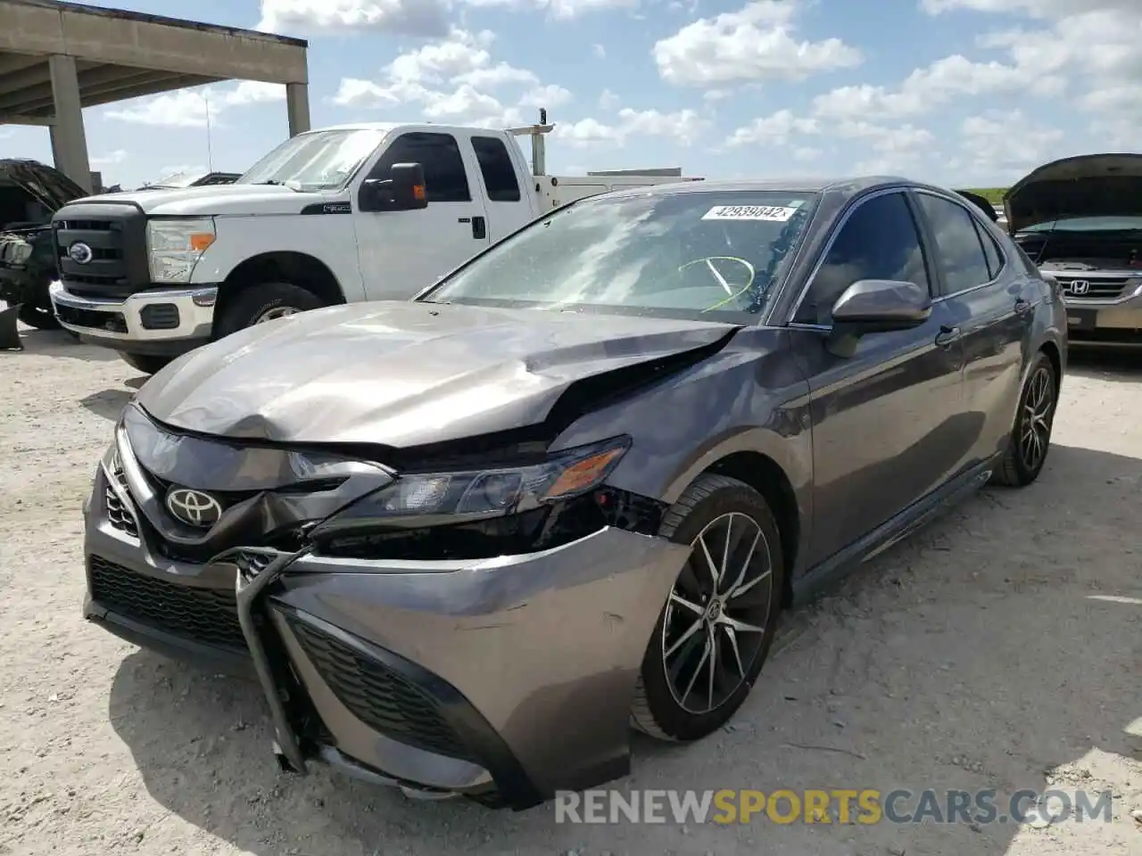 2 Photograph of a damaged car 4T1G11AK3MU611202 TOYOTA CAMRY 2021