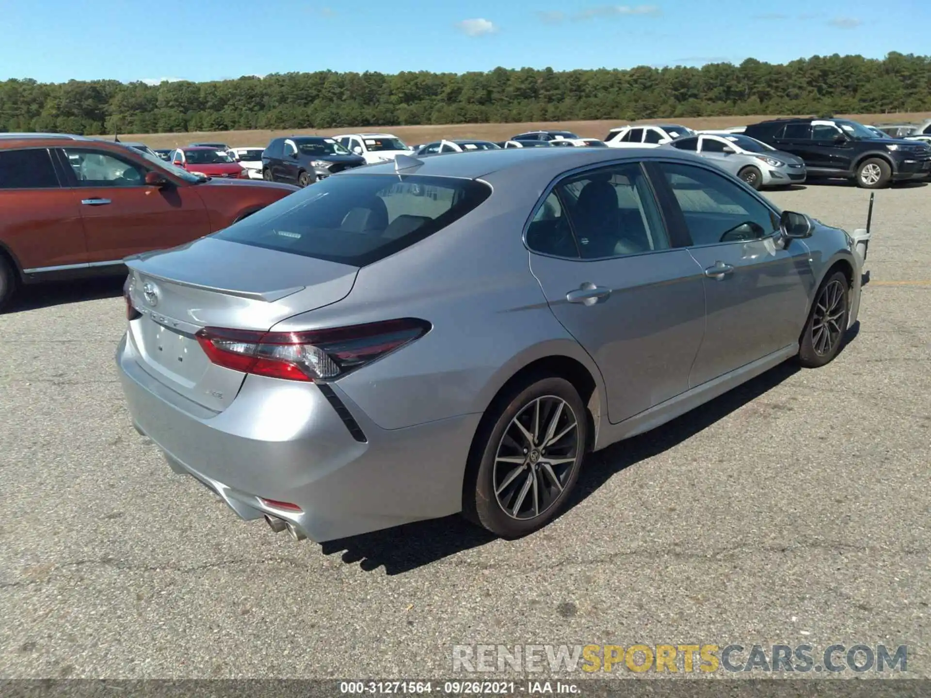 4 Photograph of a damaged car 4T1G11AK4MU405824 TOYOTA CAMRY 2021