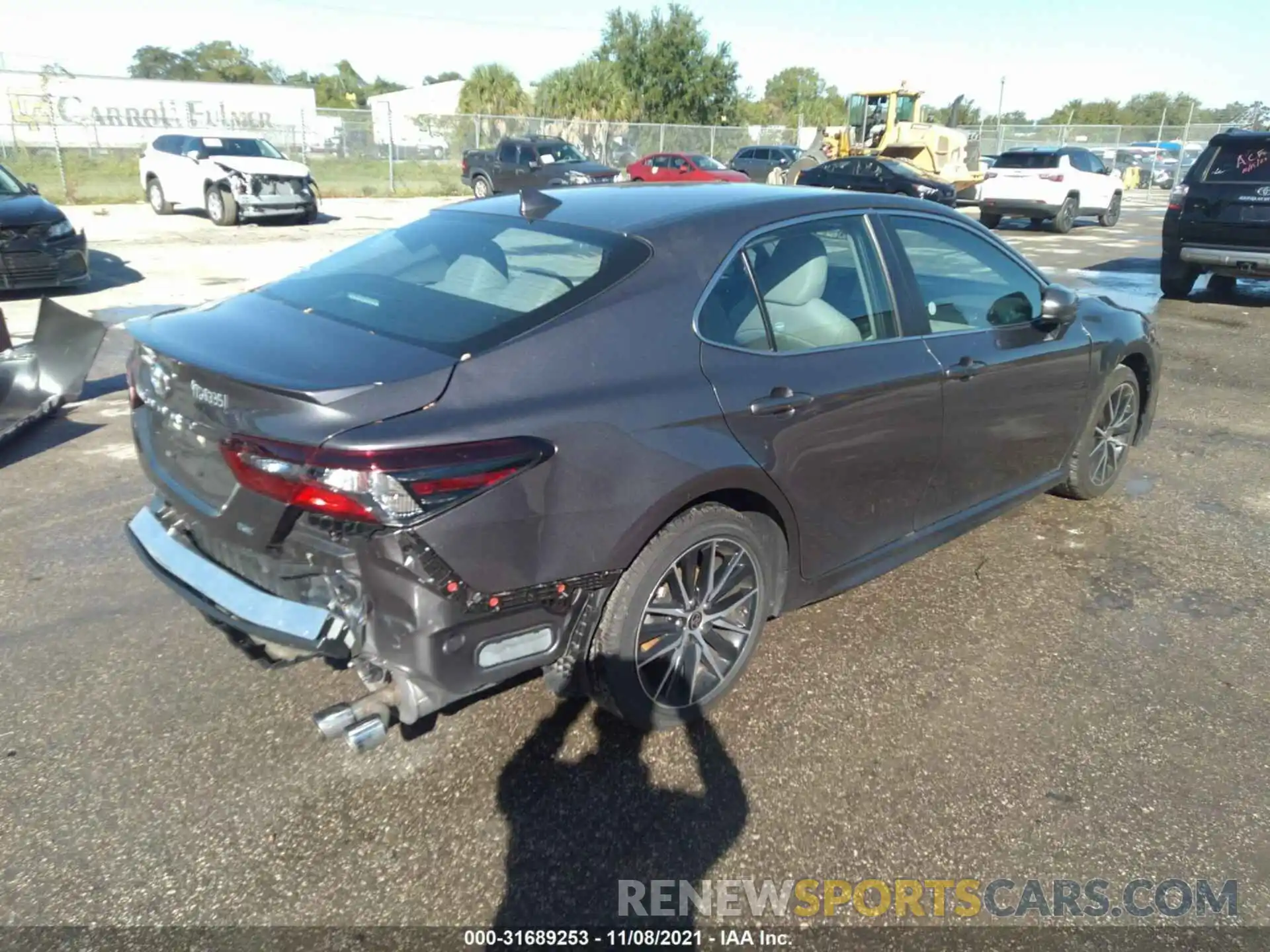 4 Photograph of a damaged car 4T1G11AK4MU589386 TOYOTA CAMRY 2021