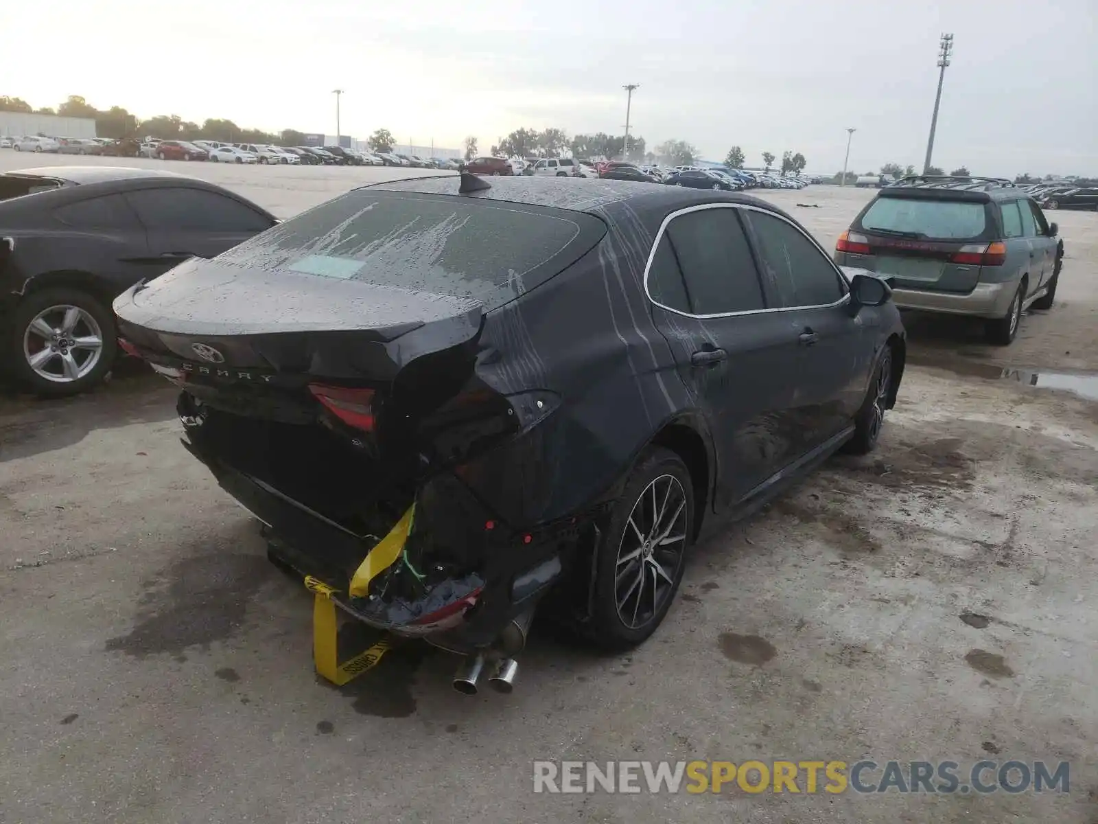 4 Photograph of a damaged car 4T1G11AK4MU598170 TOYOTA CAMRY 2021