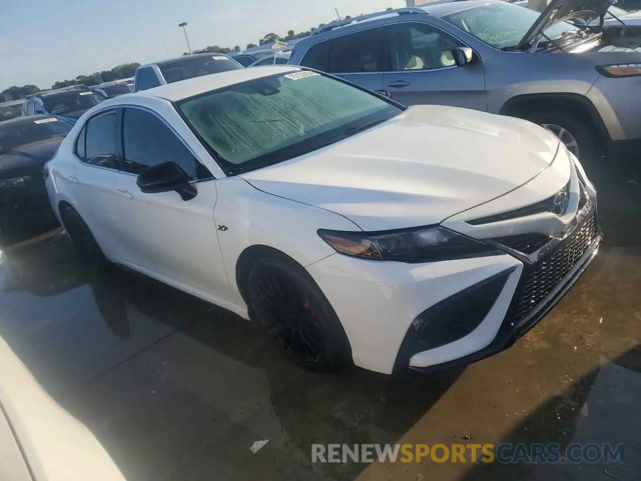 4 Photograph of a damaged car 4T1G11AK4MU601567 TOYOTA CAMRY 2021