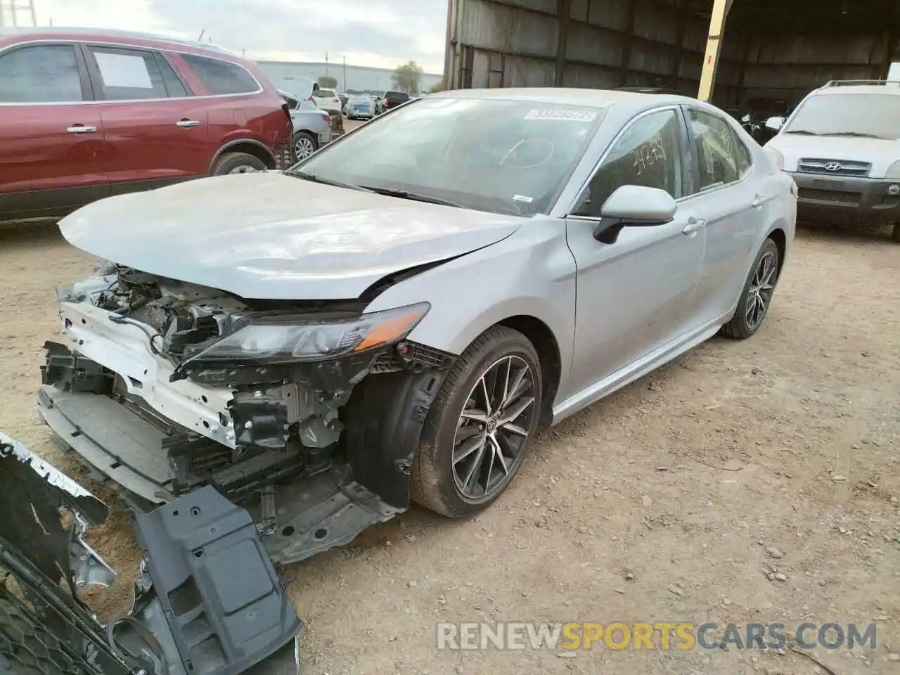 2 Photograph of a damaged car 4T1G11AK5MU407405 TOYOTA CAMRY 2021