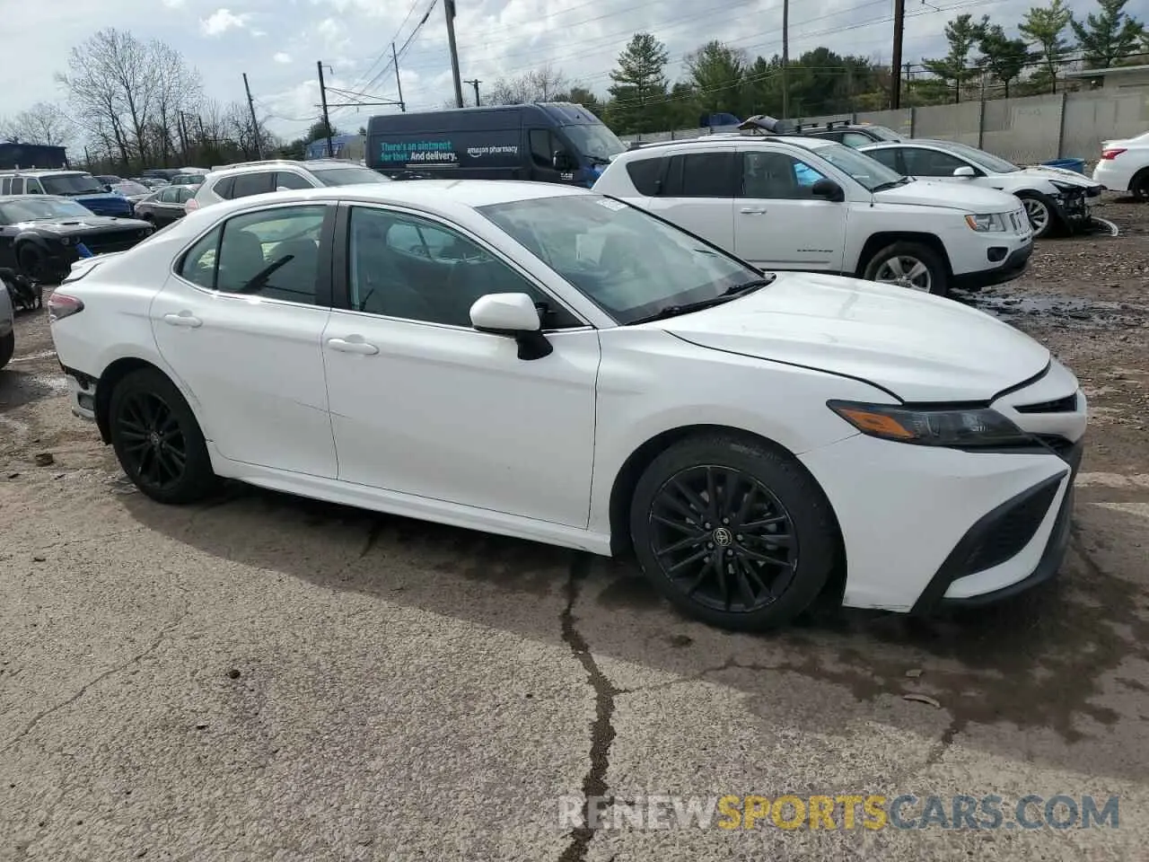 4 Photograph of a damaged car 4T1G11AK5MU412927 TOYOTA CAMRY 2021