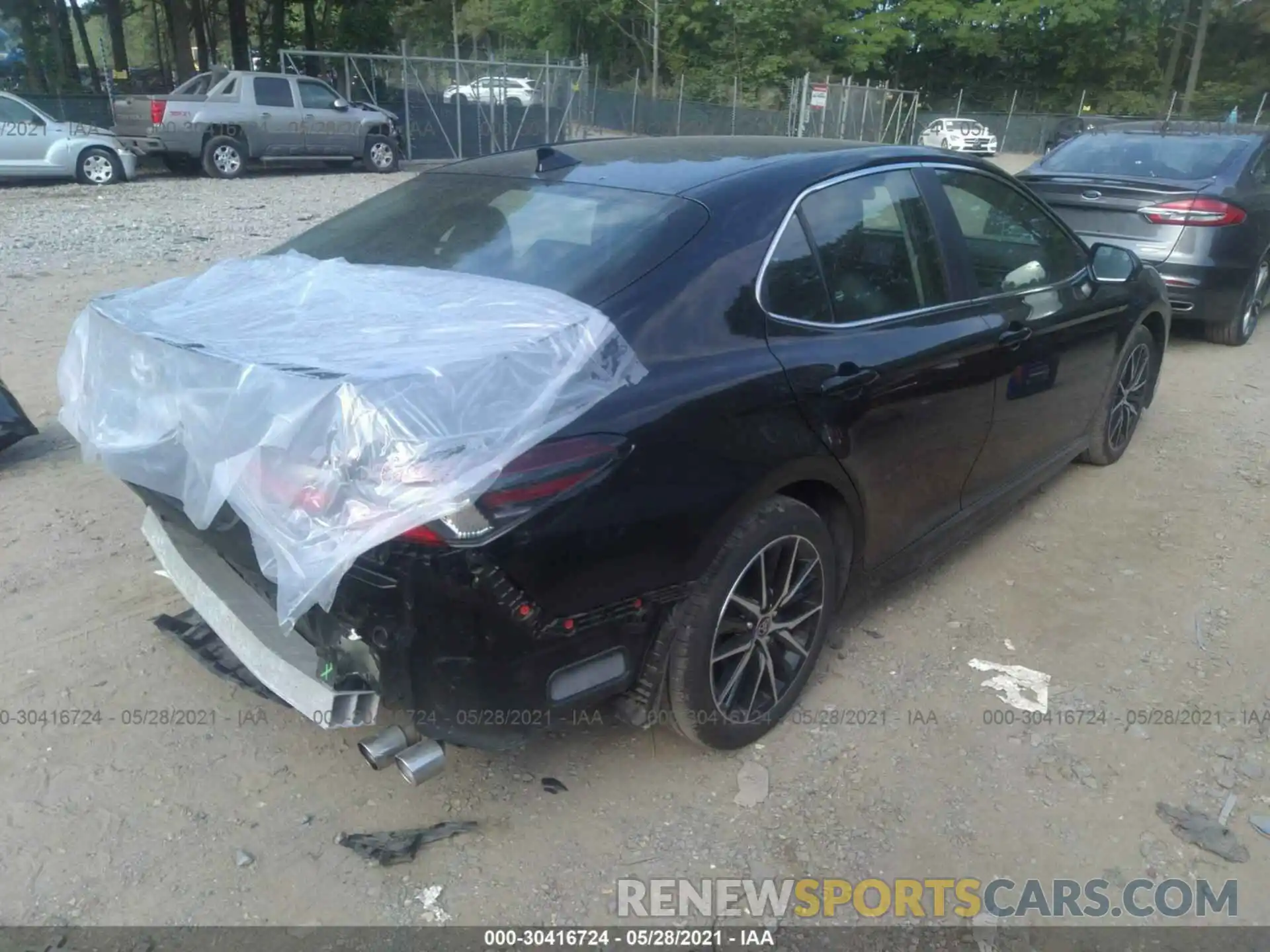 4 Photograph of a damaged car 4T1G11AK5MU552380 TOYOTA CAMRY 2021