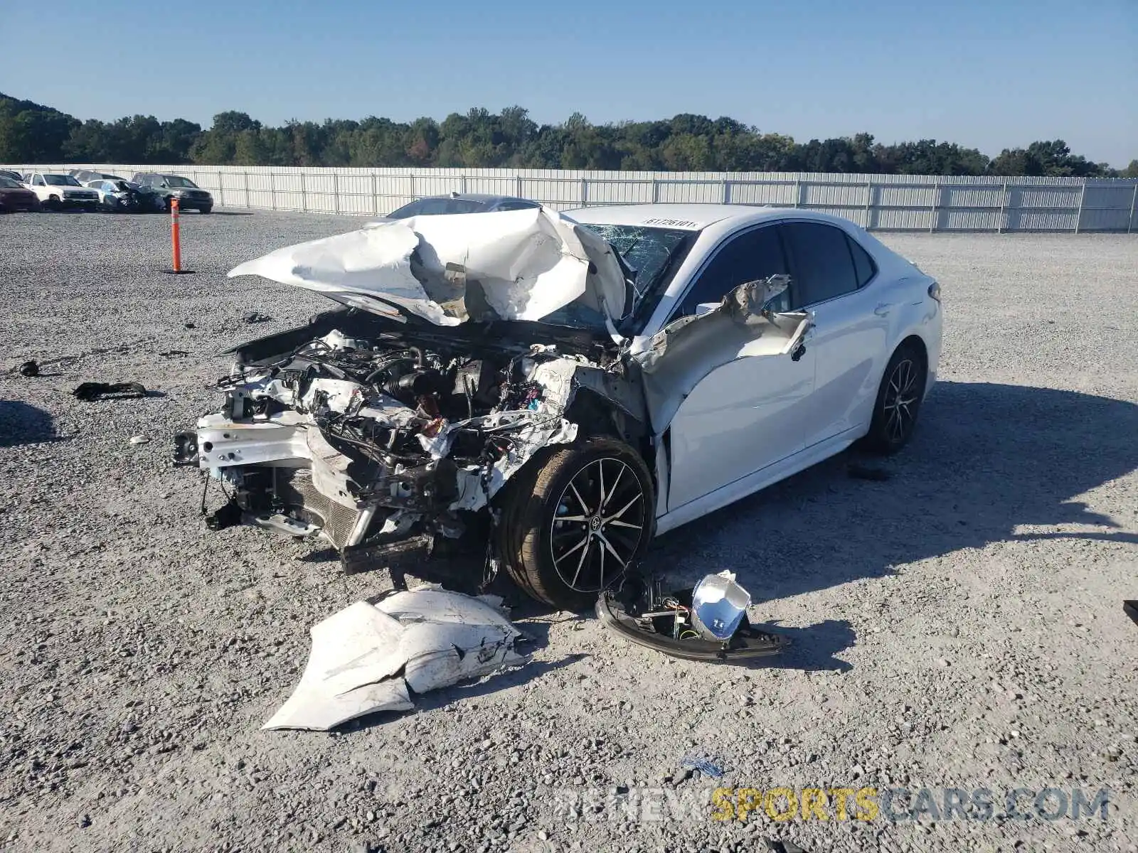 2 Photograph of a damaged car 4T1G11AK5MU563587 TOYOTA CAMRY 2021