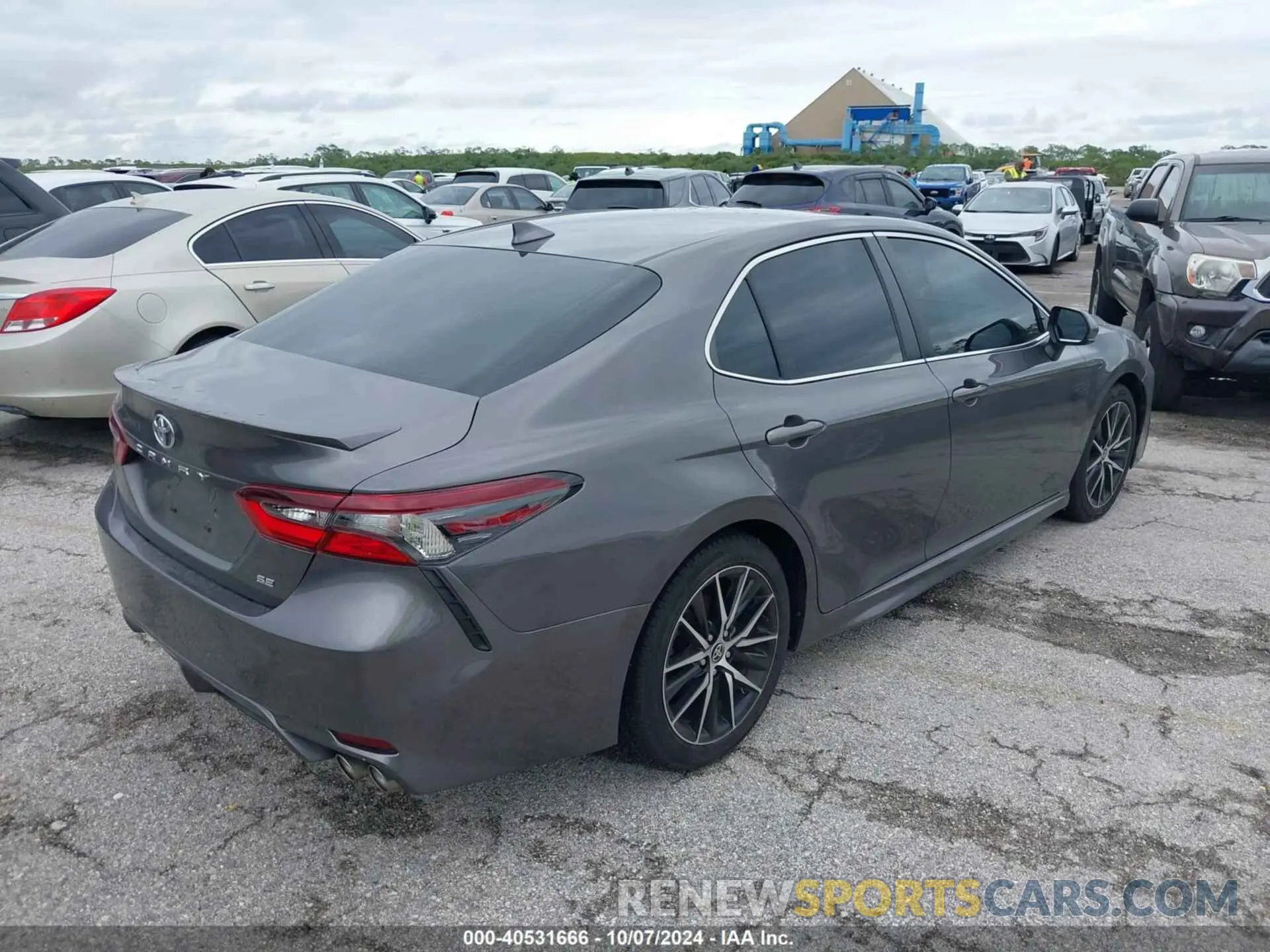 4 Photograph of a damaged car 4T1G11AK5MU583385 TOYOTA CAMRY 2021