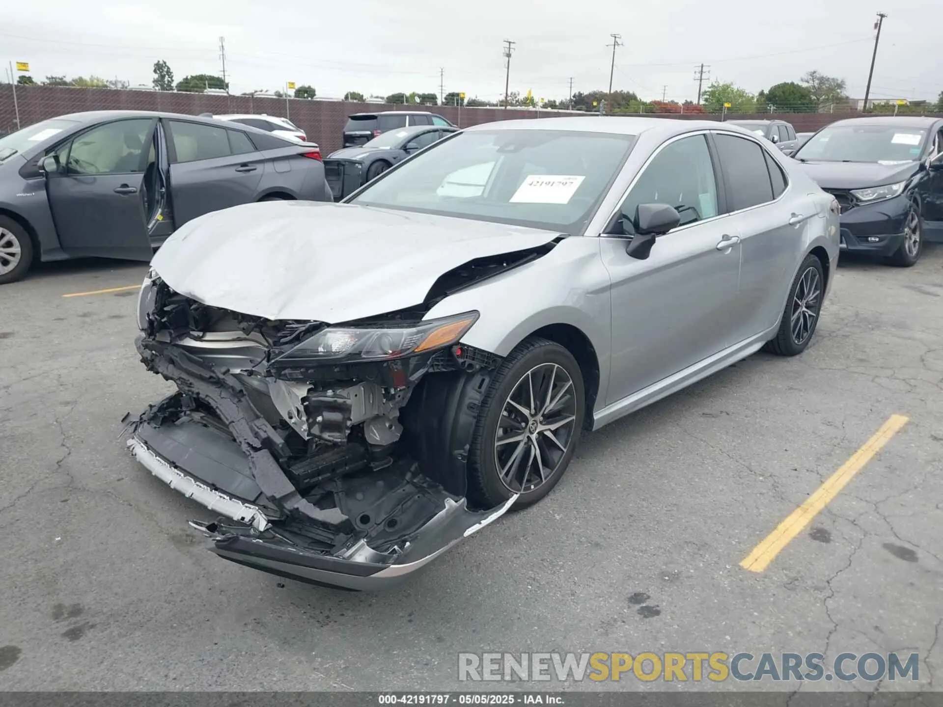 2 Photograph of a damaged car 4T1G11AK5MU590630 TOYOTA CAMRY 2021