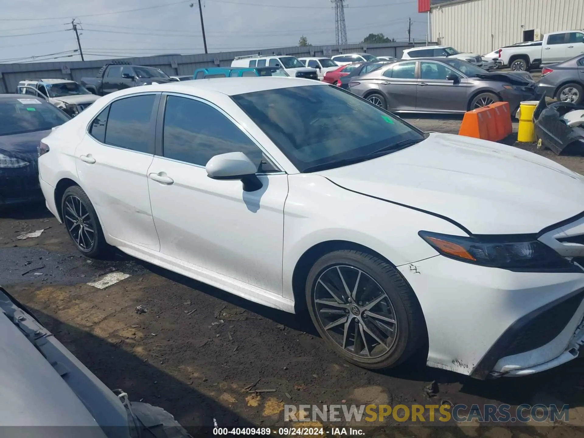 13 Photograph of a damaged car 4T1G11AK5MU604140 TOYOTA CAMRY 2021