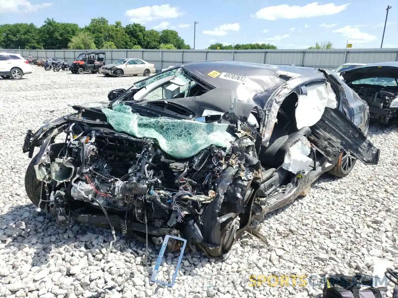 2 Photograph of a damaged car 4T1G11AK6MU406604 TOYOTA CAMRY 2021