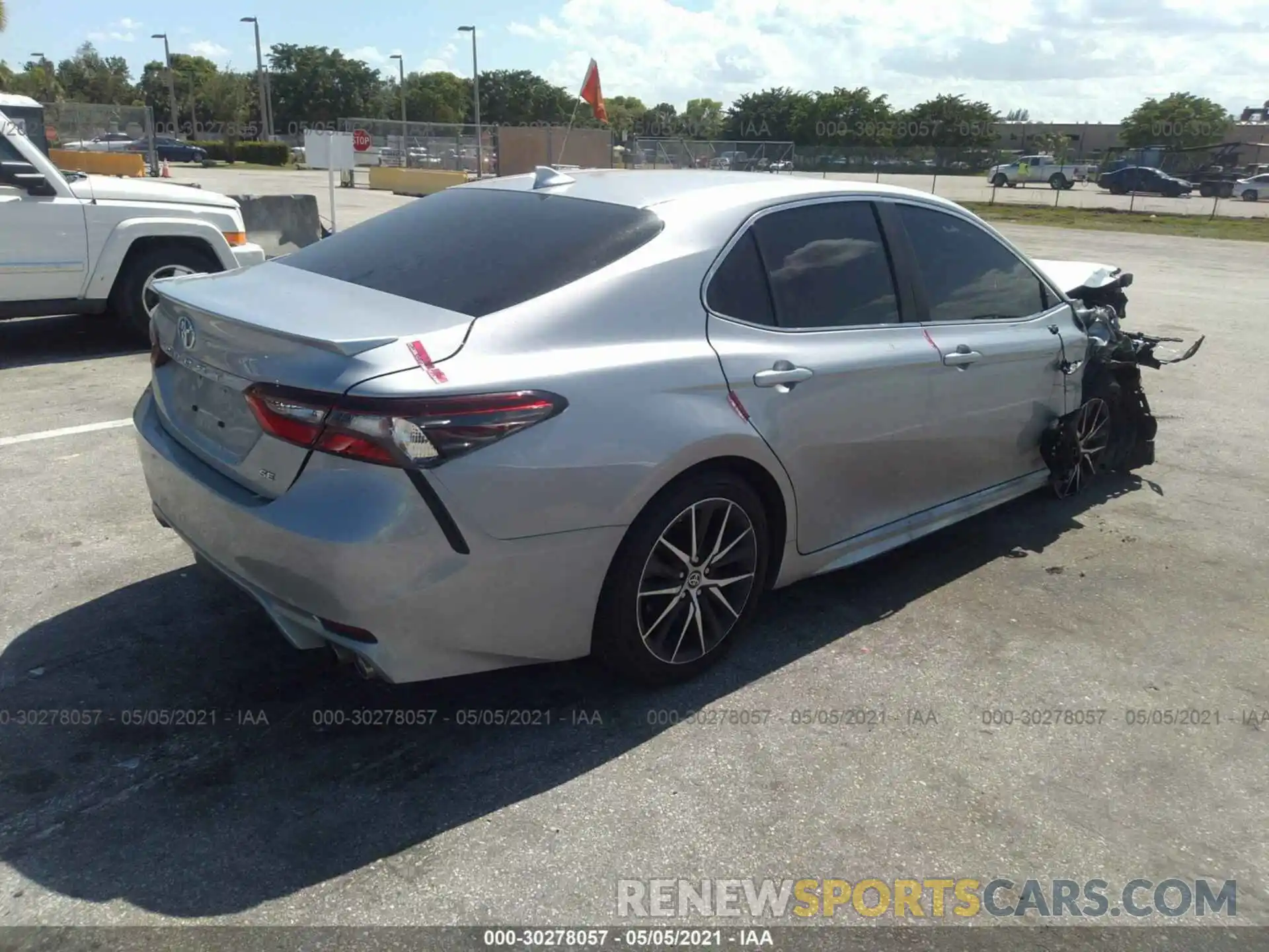 4 Photograph of a damaged car 4T1G11AK6MU410572 TOYOTA CAMRY 2021